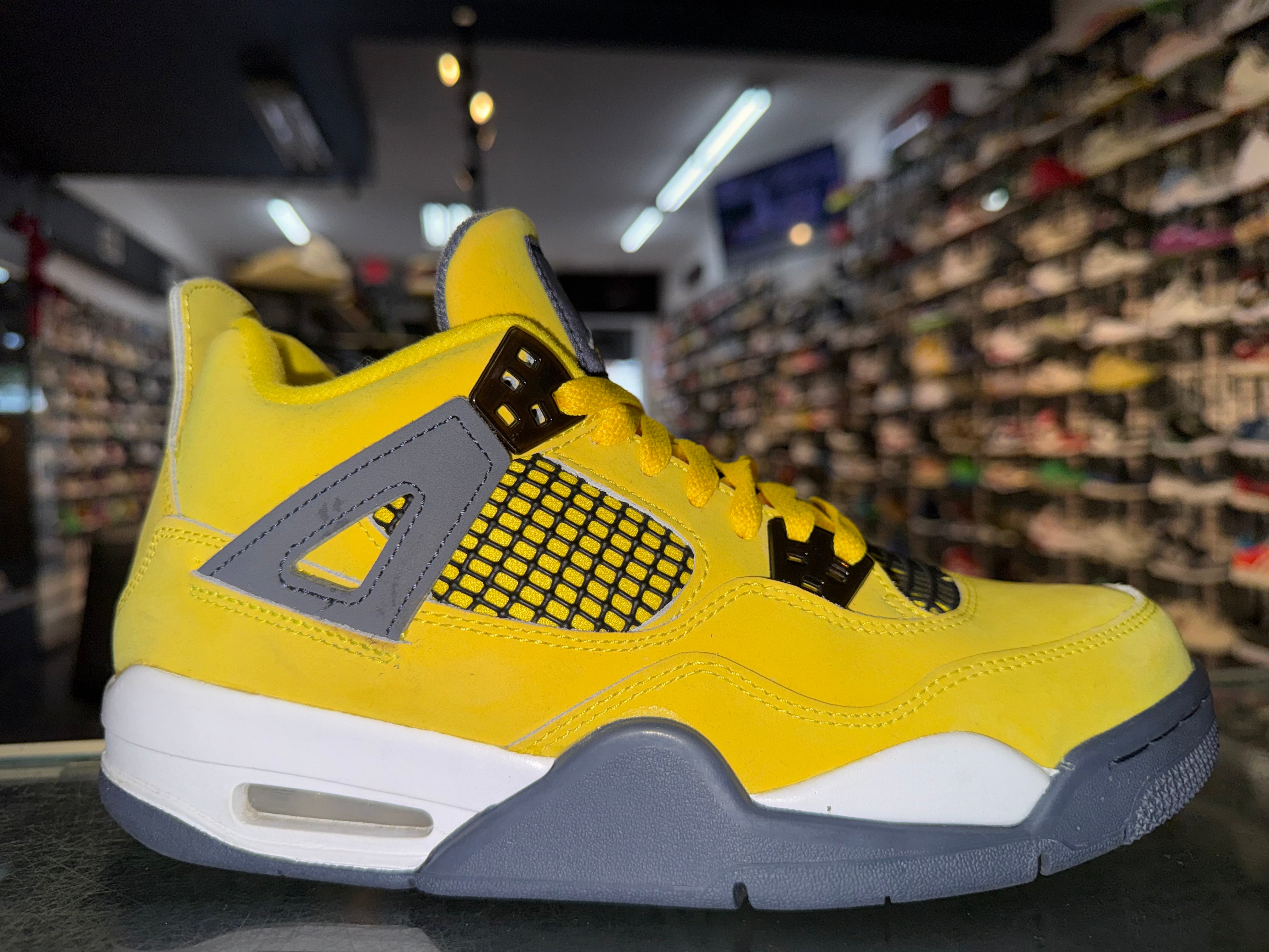 Size 7y Air Jordan 4 "Lightning"