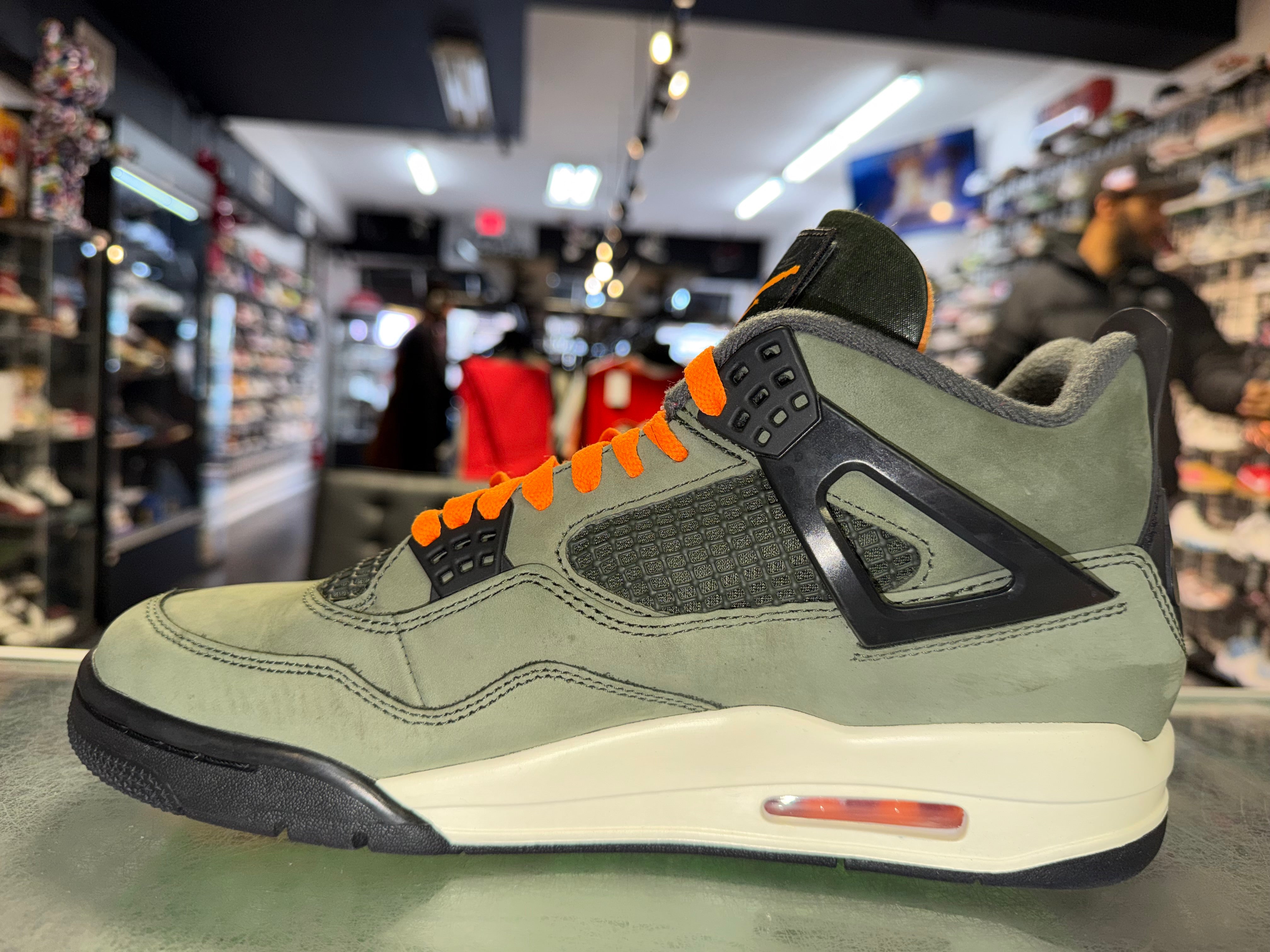 Size 10.5 Air Jordan 4 "Undefeated"