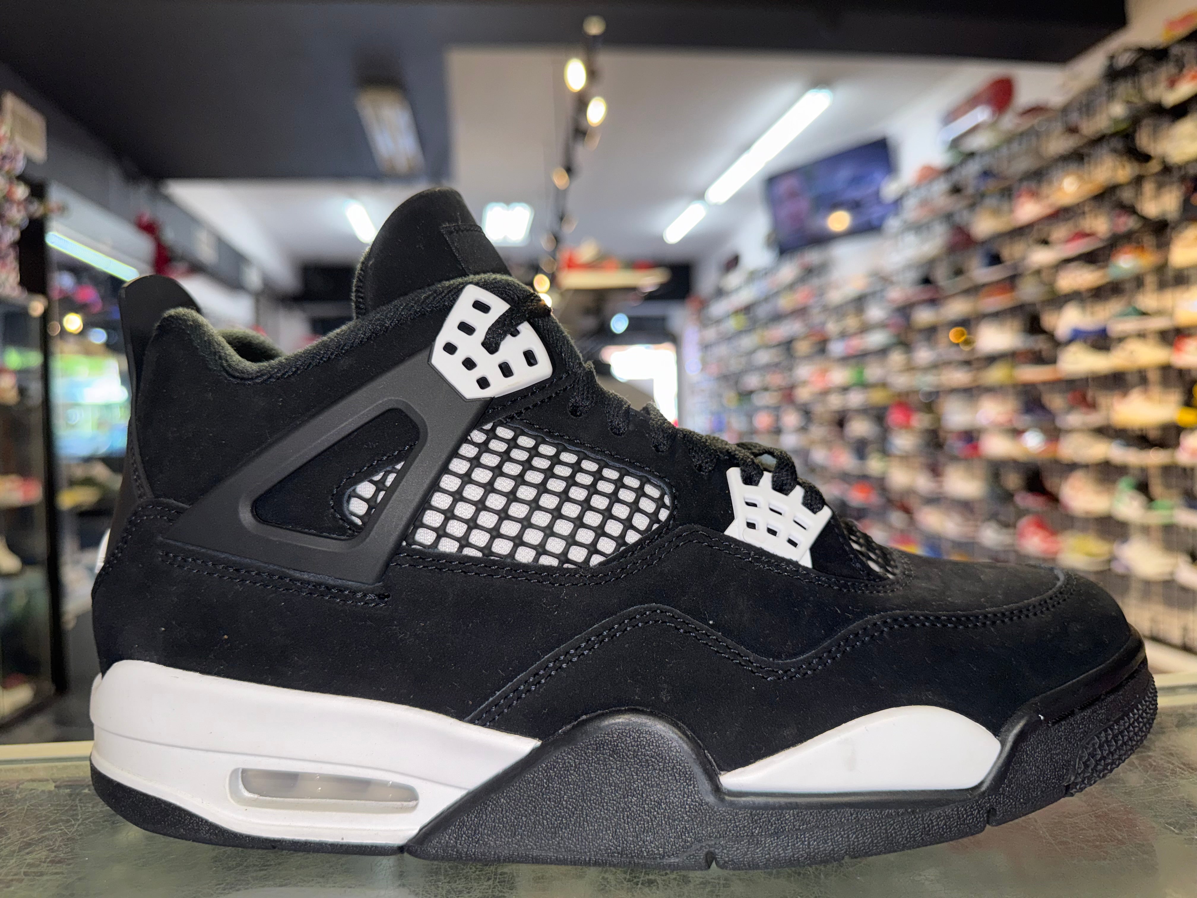Size 9.5 Air Jordan 4 "White Thunder"