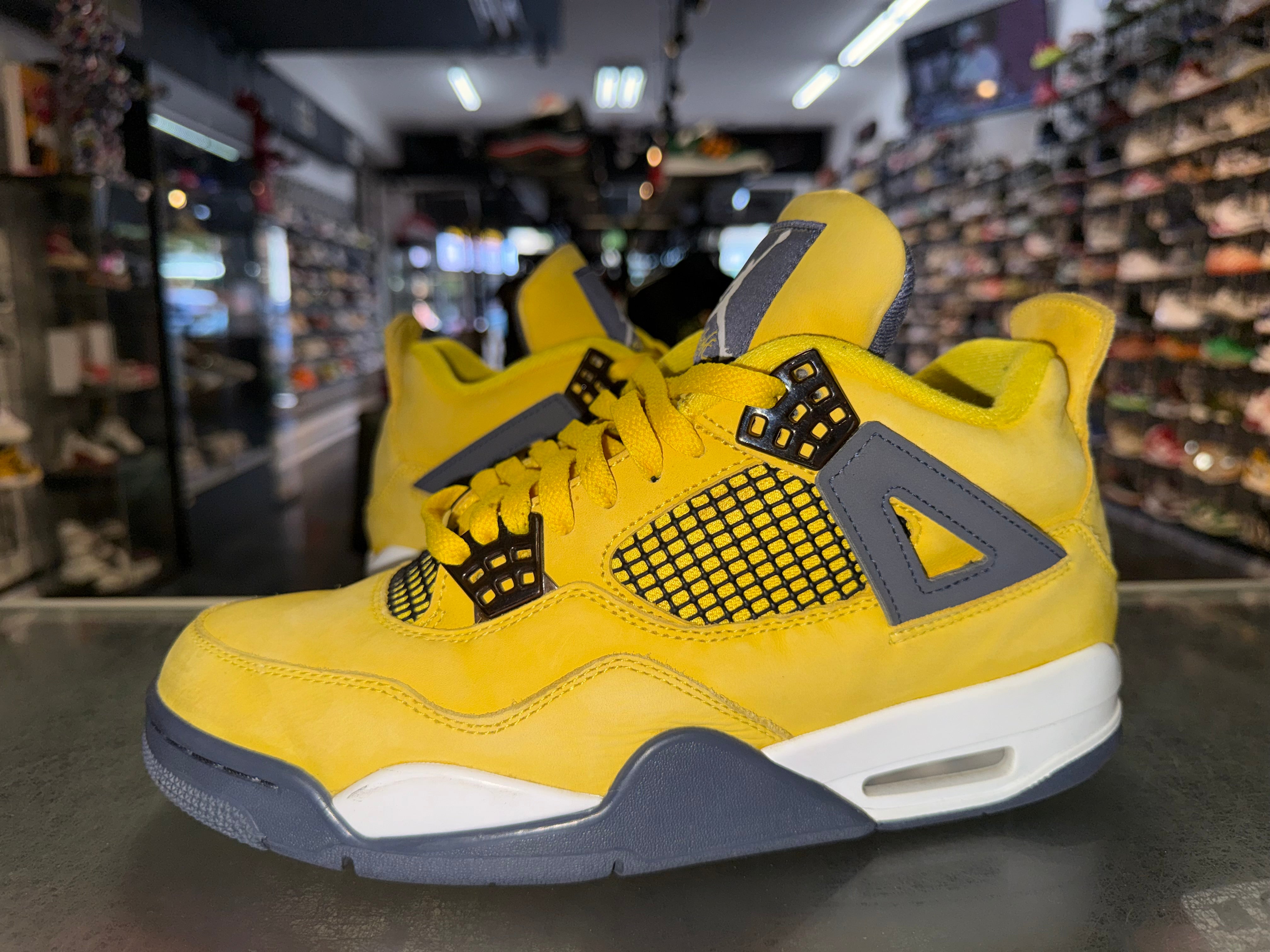 Size 9.5 Air Jordan 4 "Lightning"