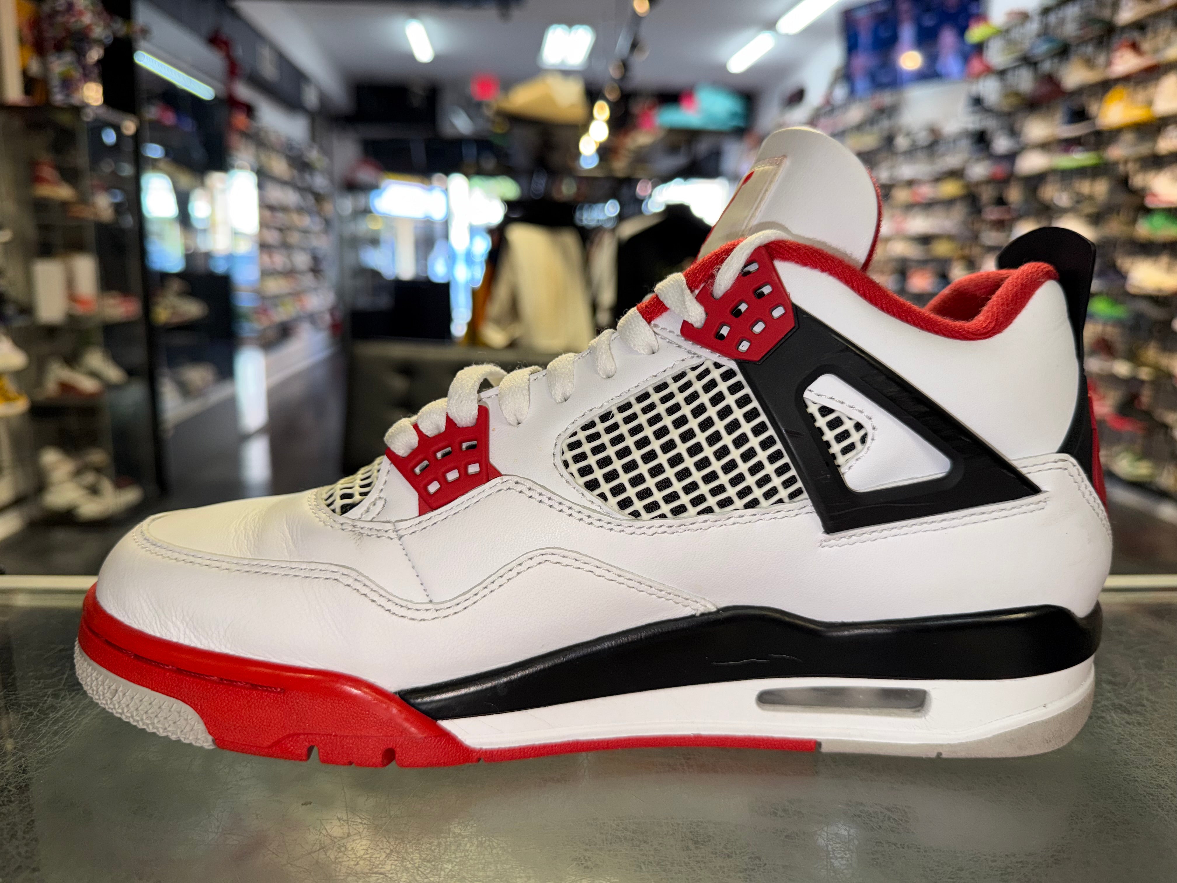 Size 9.5 Air Jordan 4 "Fire Red"
