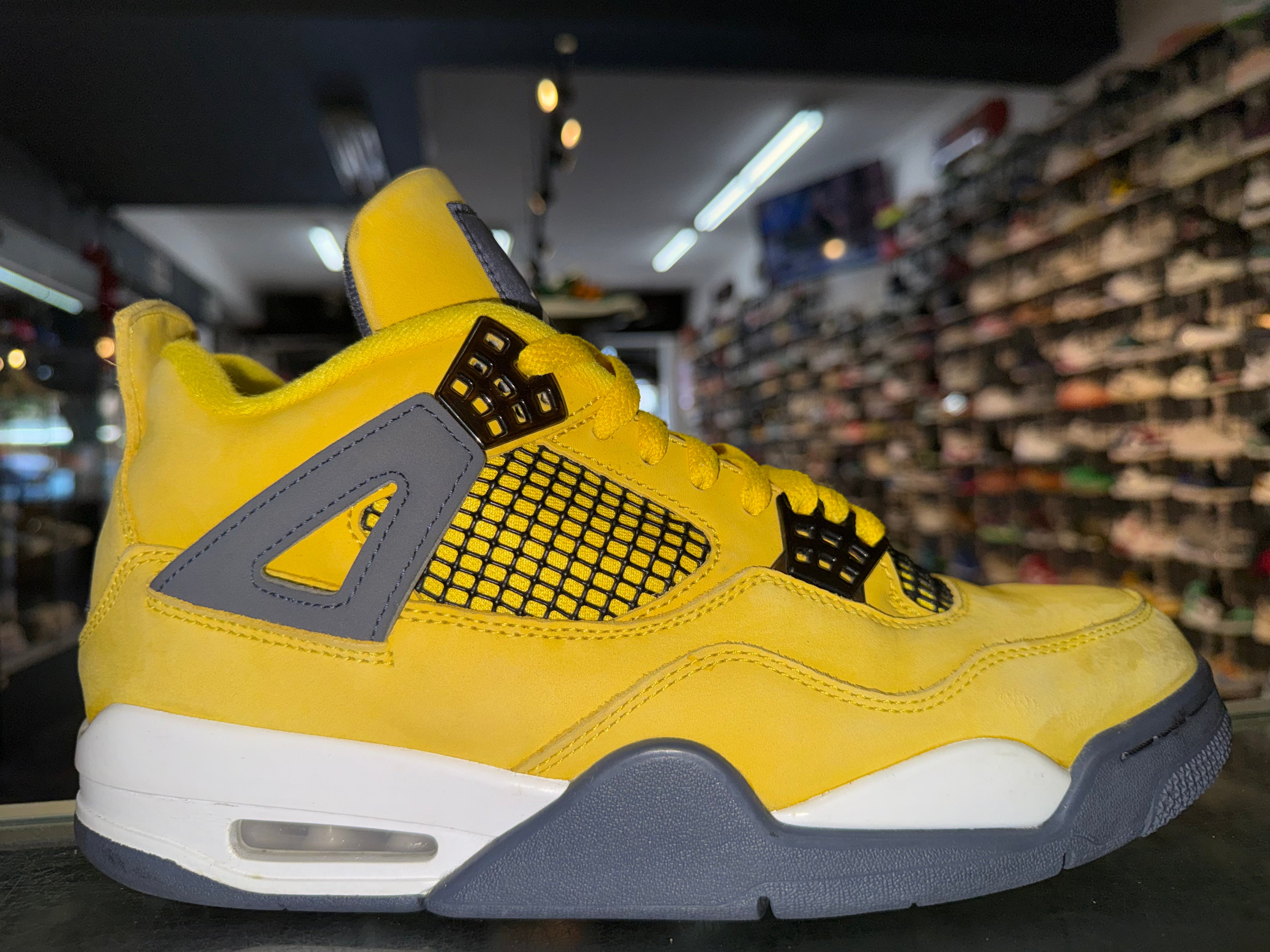 Size 9.5 Air Jordan 4 "Lightning"