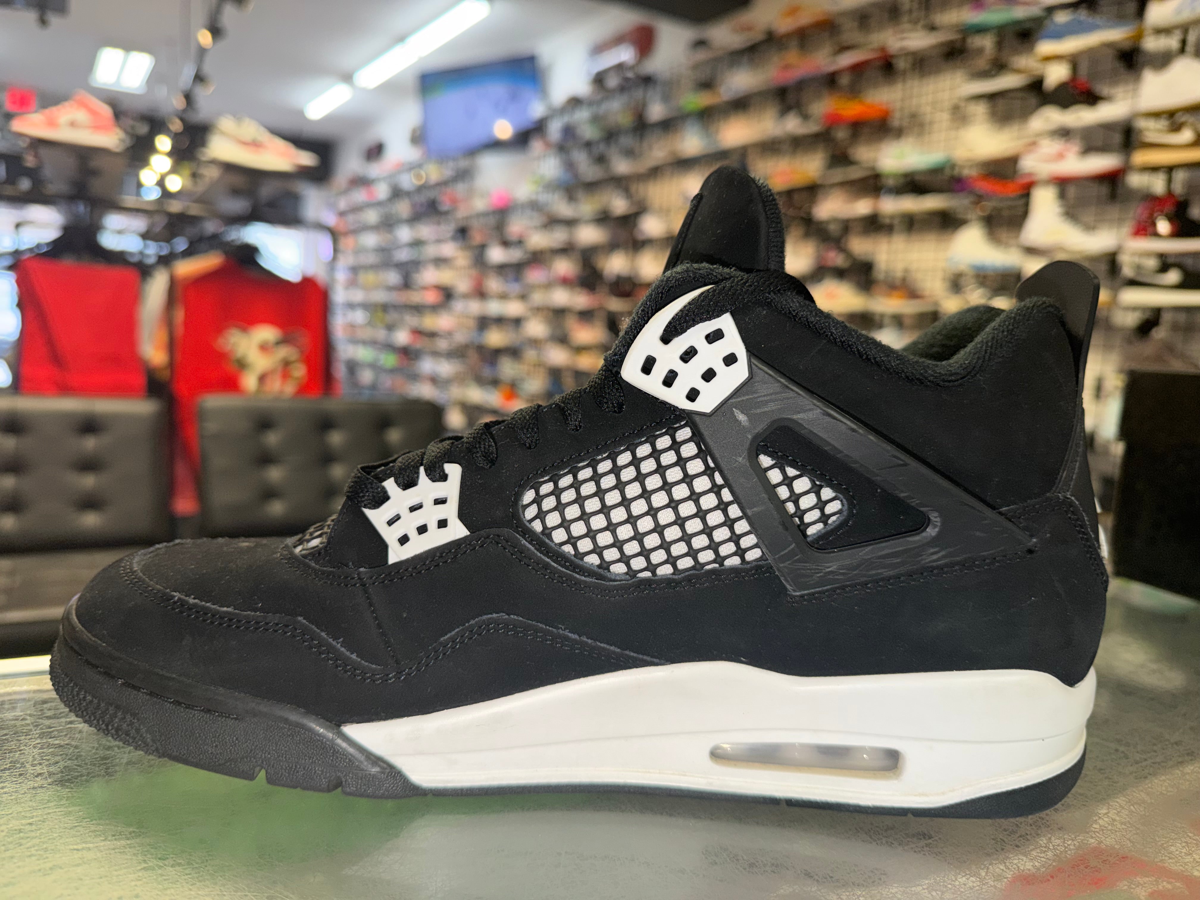 Size 12 Air Jordan 4 "White Thunder"