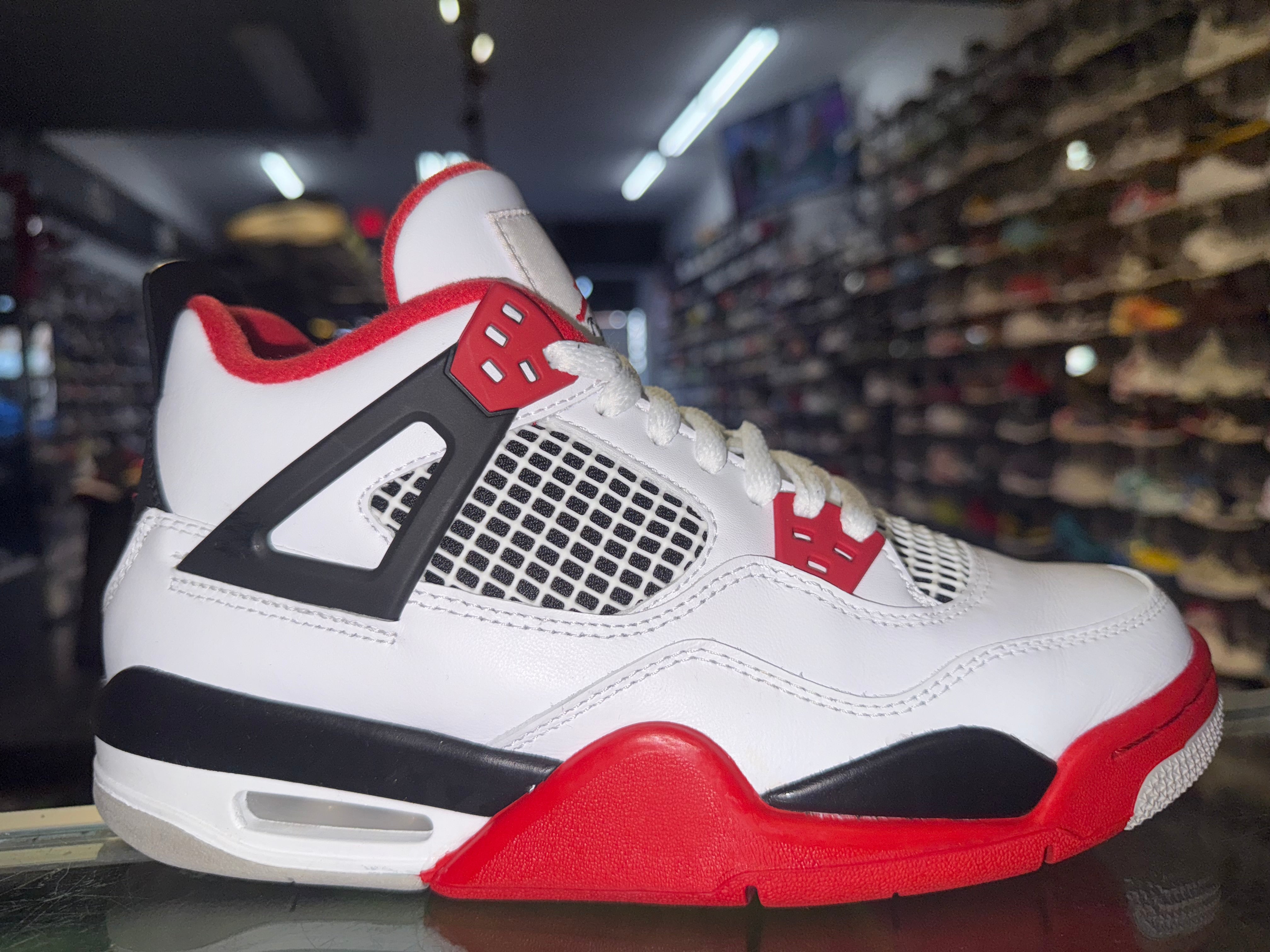Size 6y Air Jordan 4 "Fire Red"