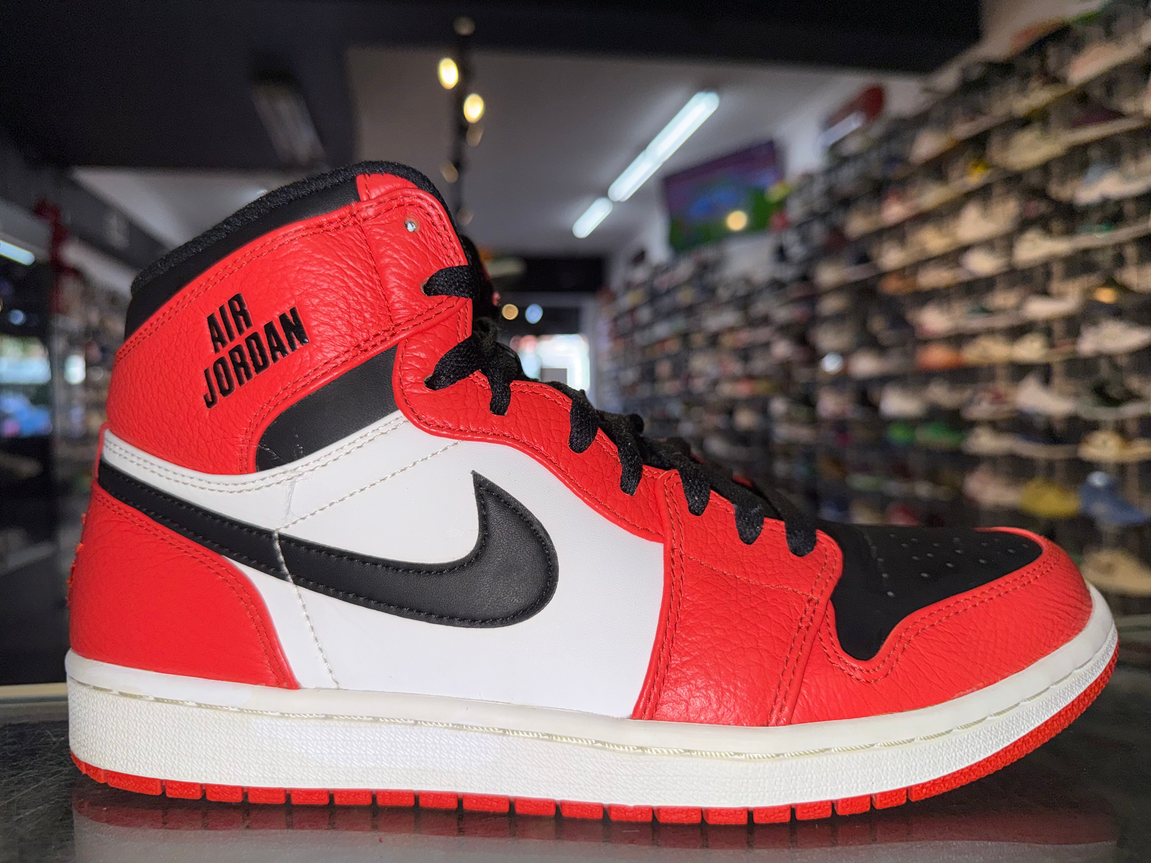Size 10 Air Jordan 1 Rare Air "Max Orange”