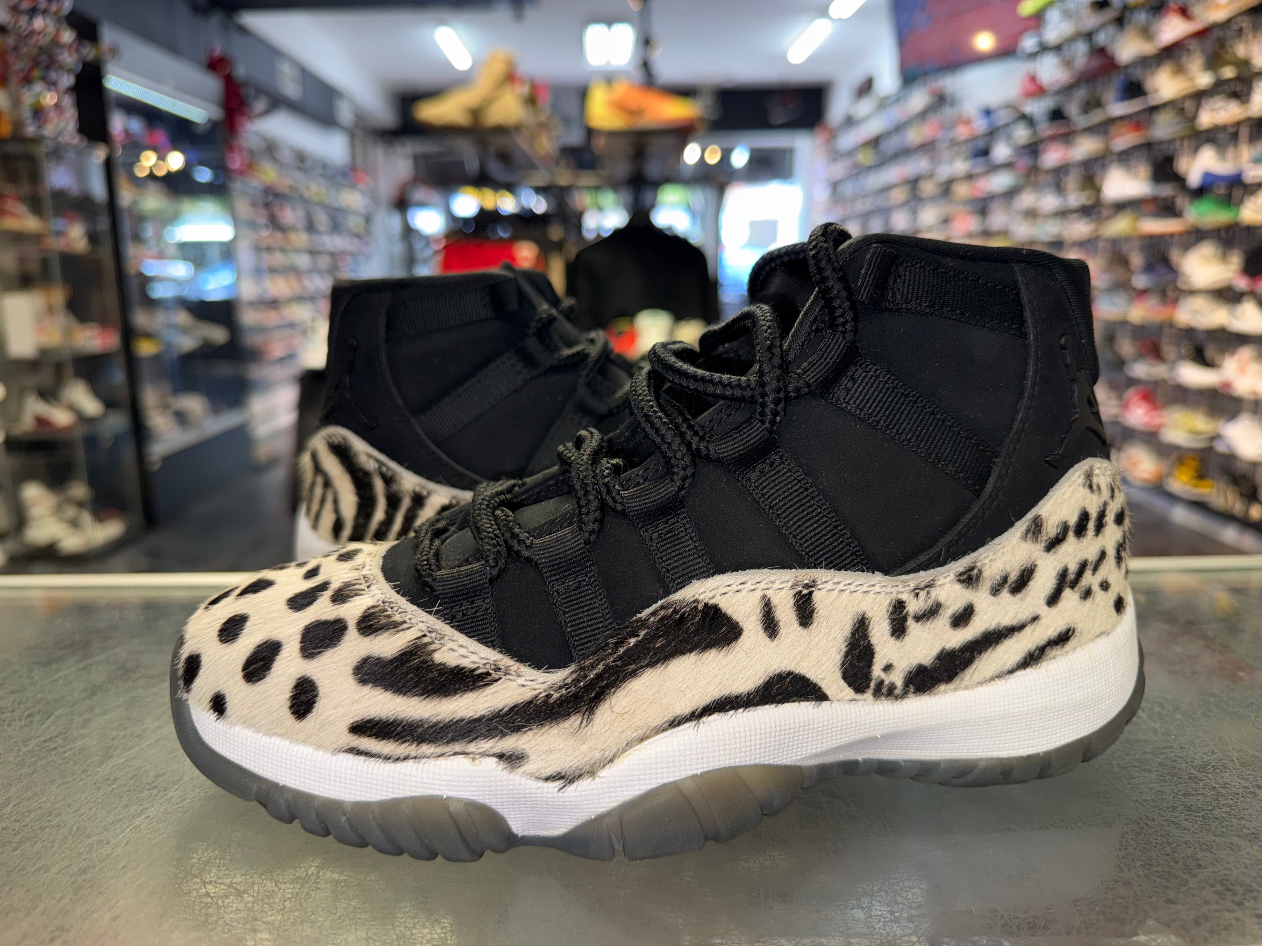 Size 5 (6.5W) Air Jordan 11 "Animal Instinct"