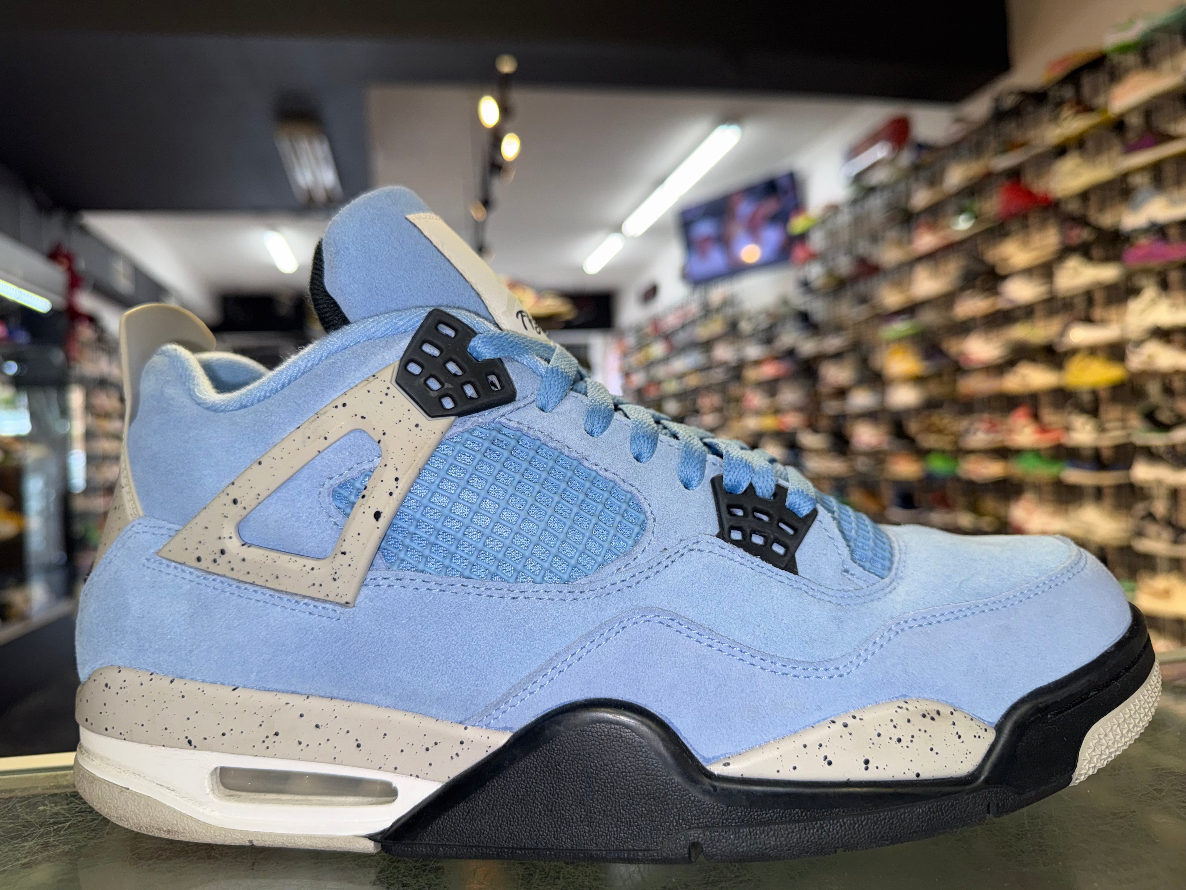 Size 11.5 Air Jordan 4 “University Blue”