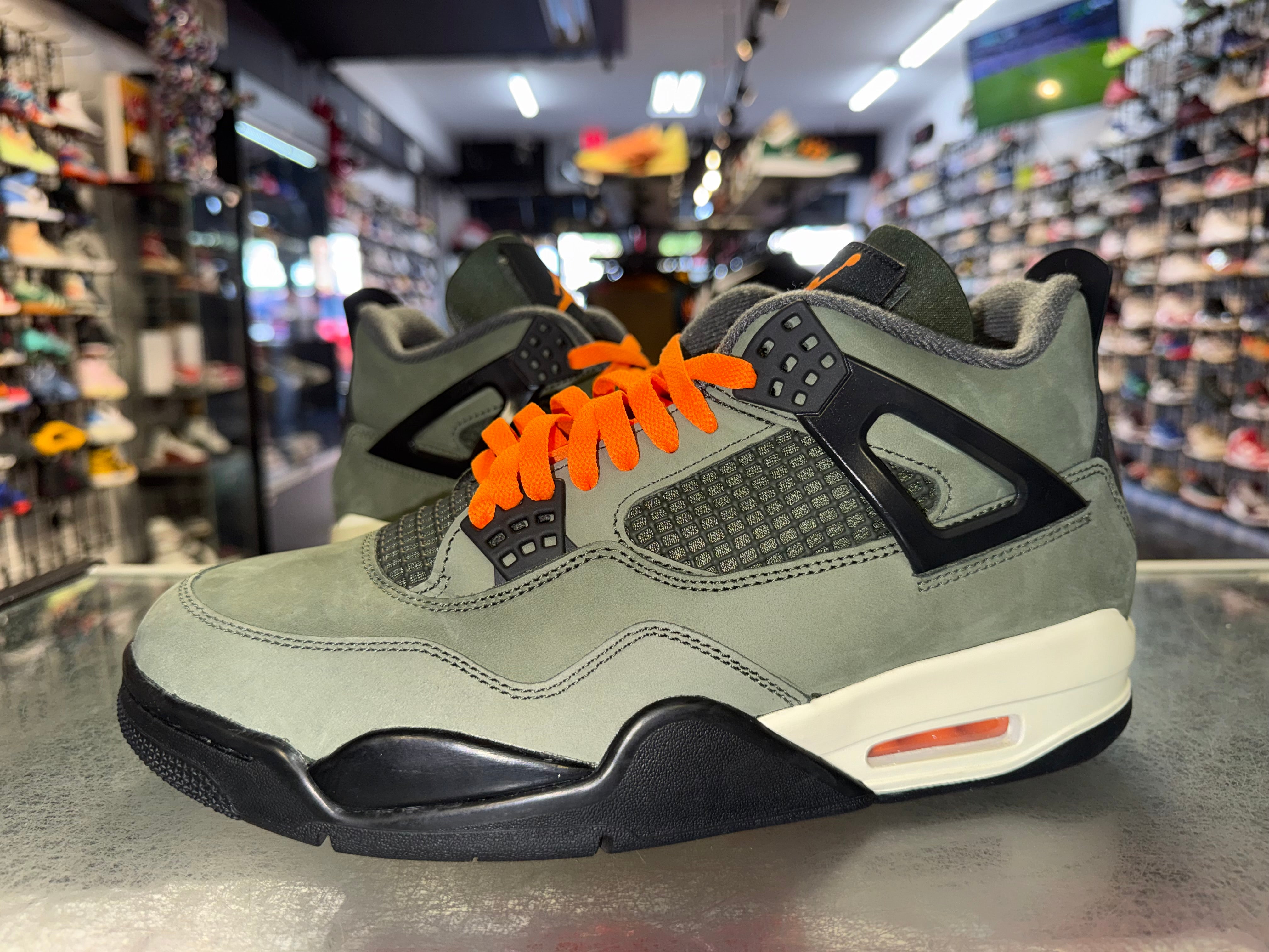 Size 9.5 Air Jordan 4 "Undefeated"