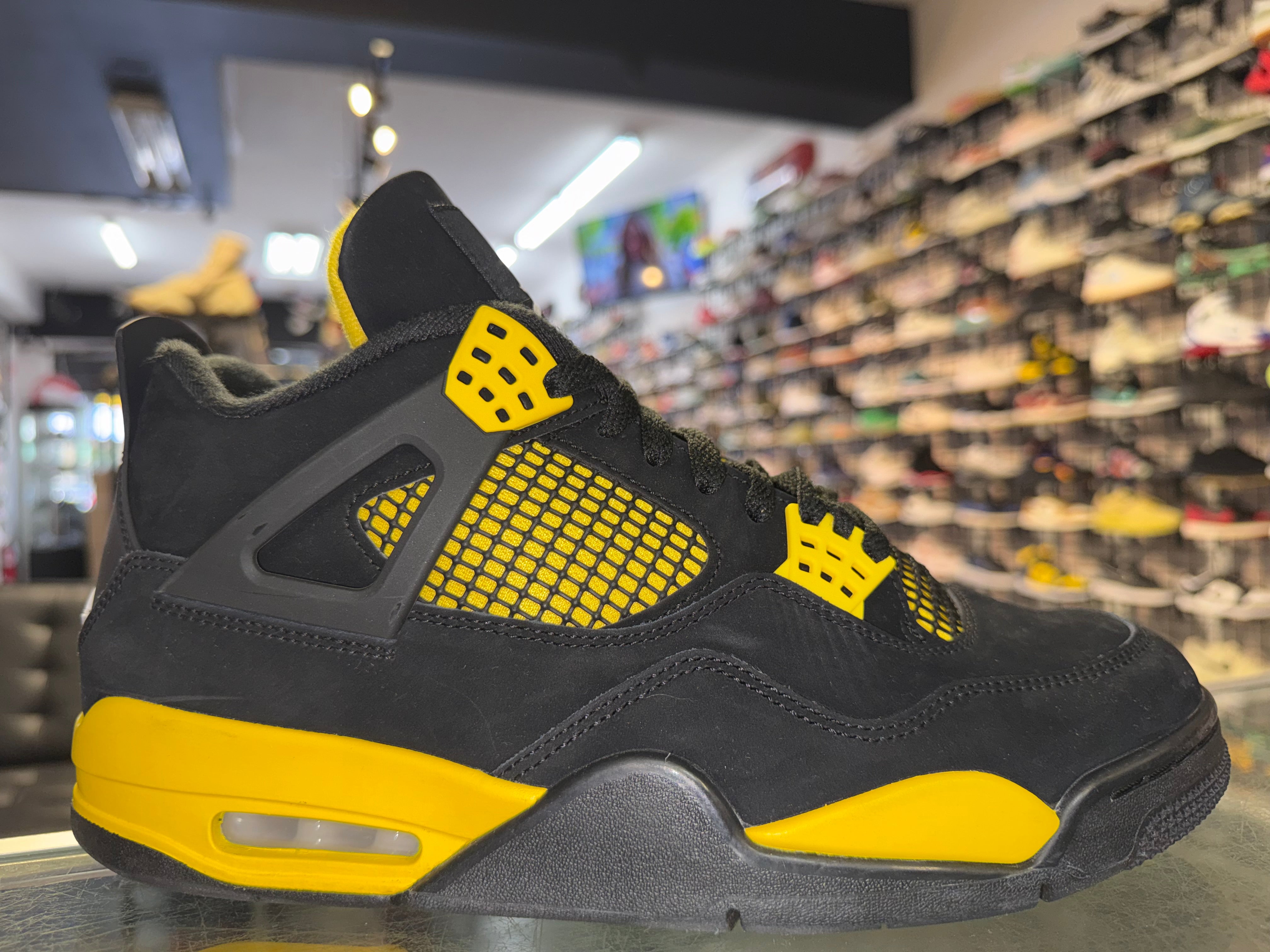 Size 10 Air Jordan 4 "Thunder"