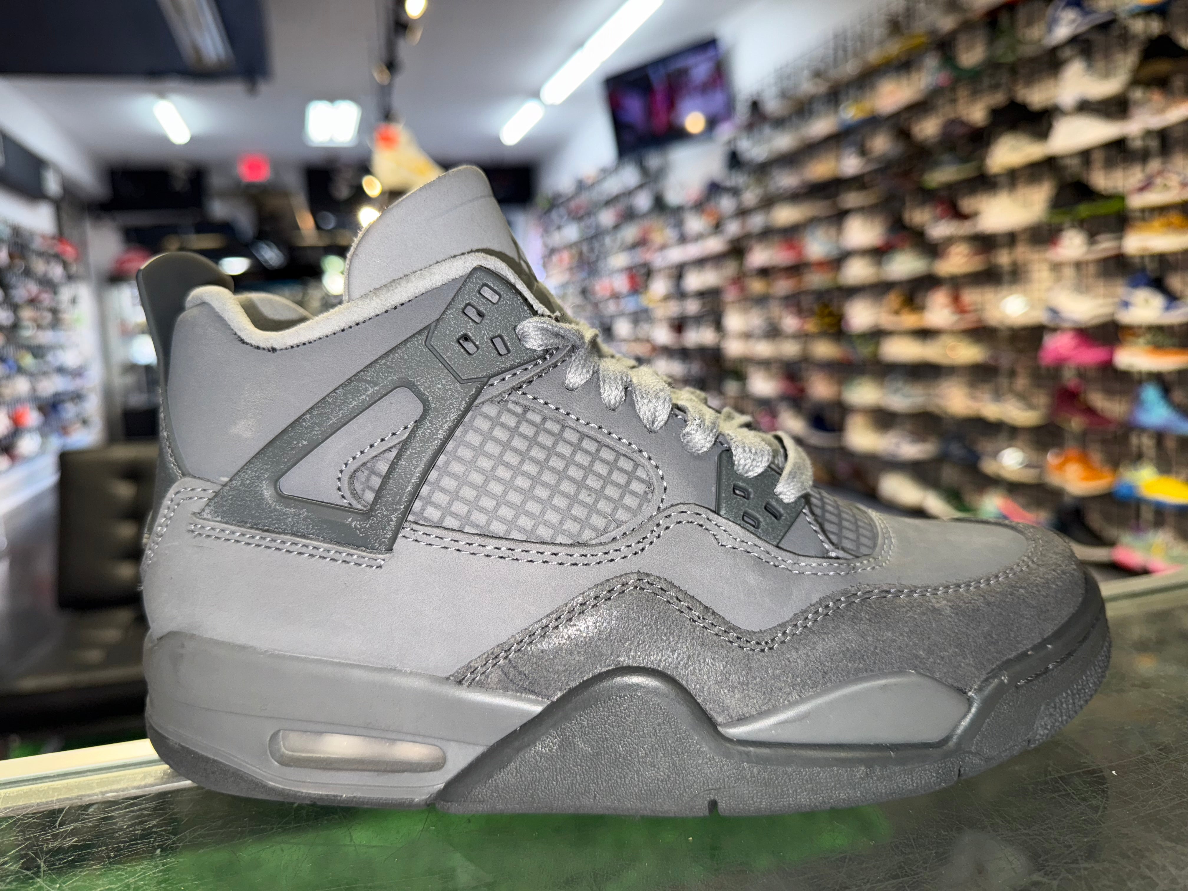 Size 6y Air Jordan 4 "Wet Cement"