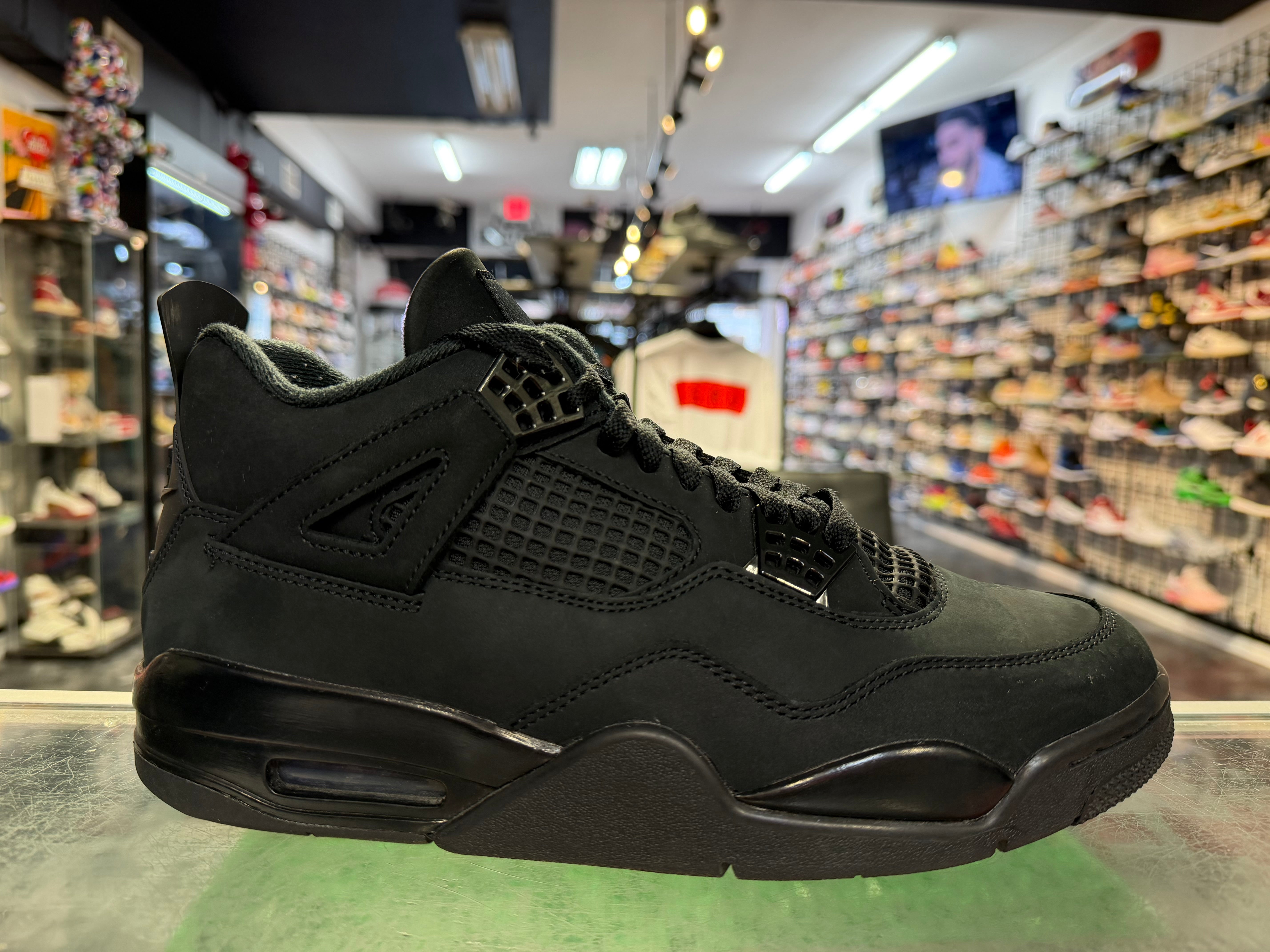 Size 9.5 Air Jordan 4 "Black Cat"