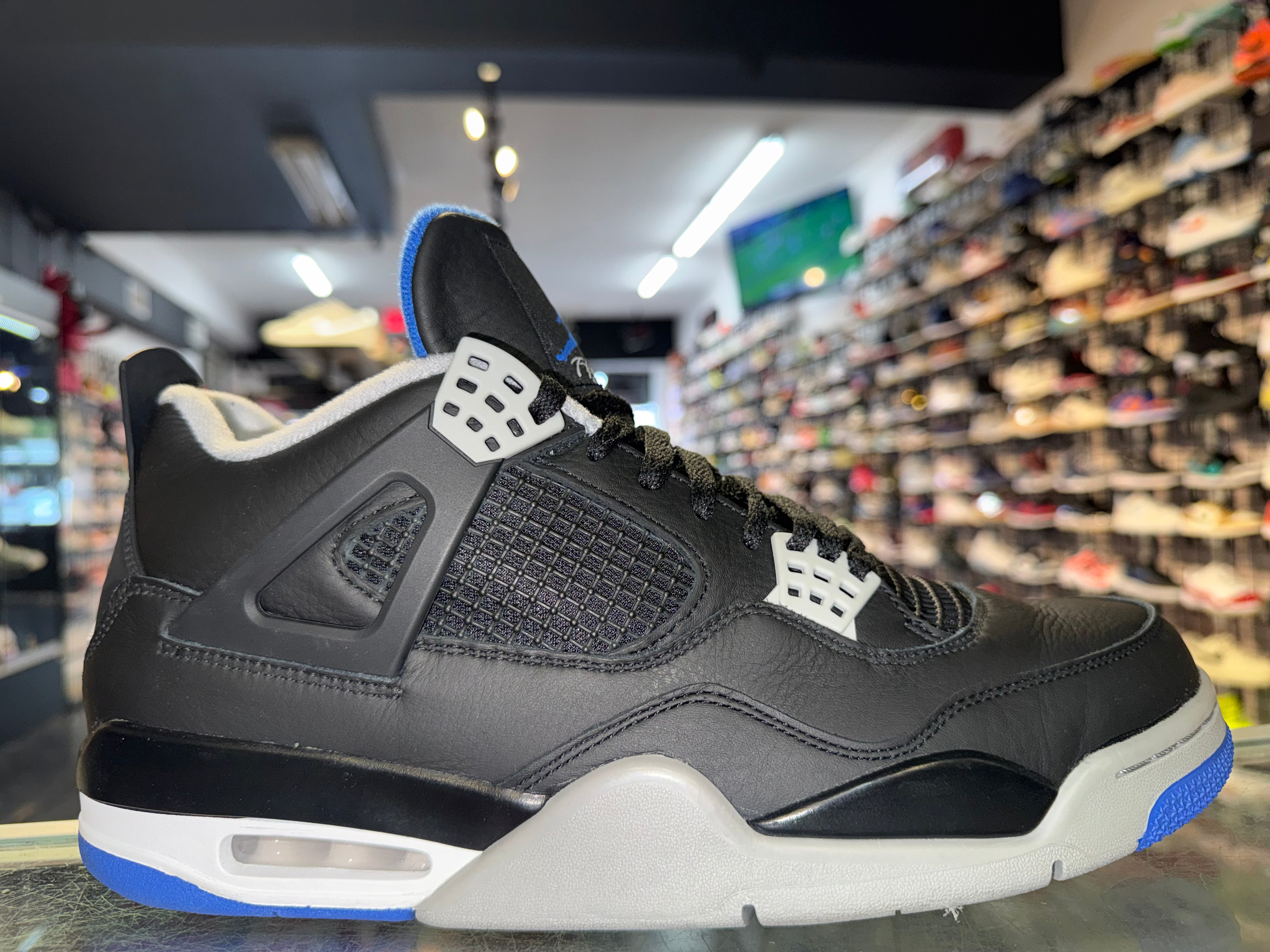 Size 12 Air Jordan 4 “Reverse Motorsports”
