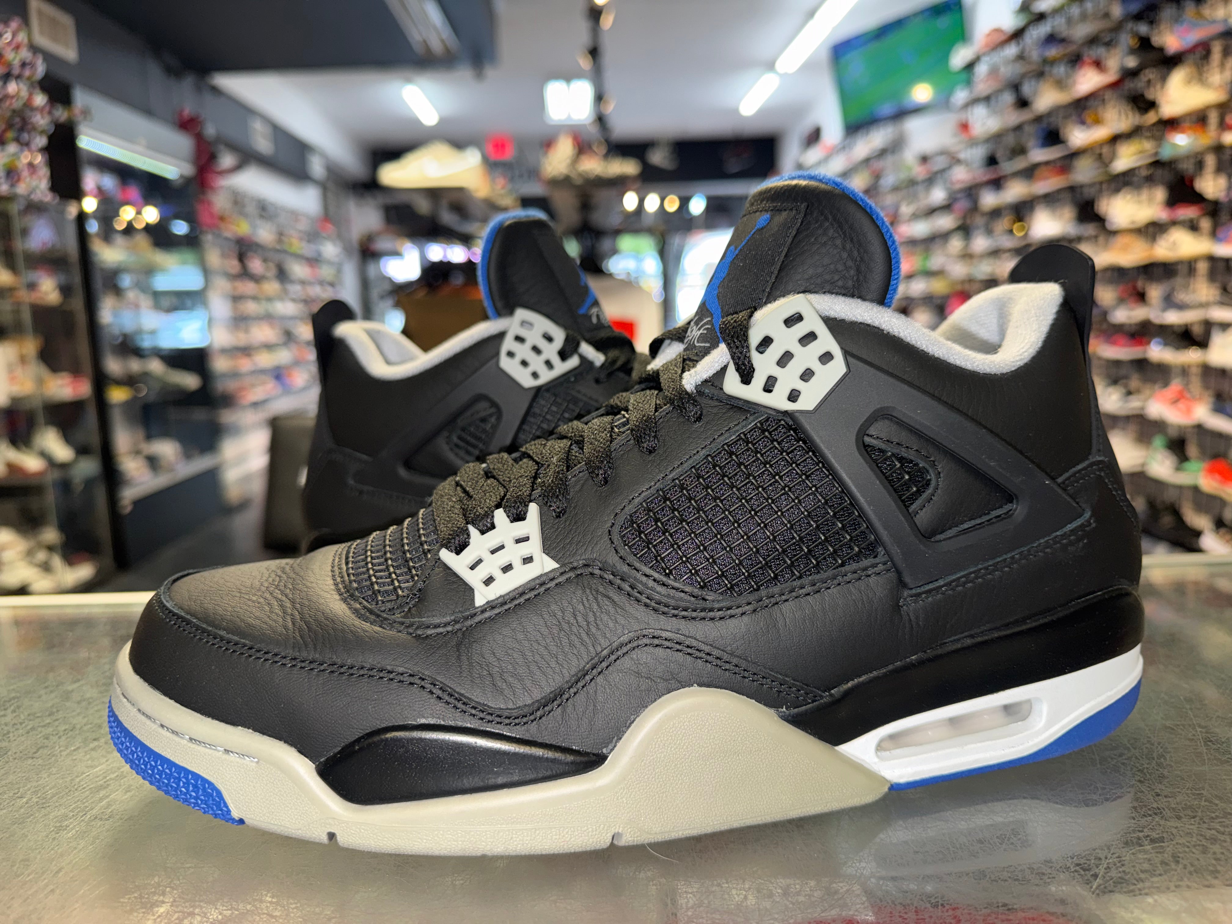 Size 12 Air Jordan 4 “Reverse Motorsports”