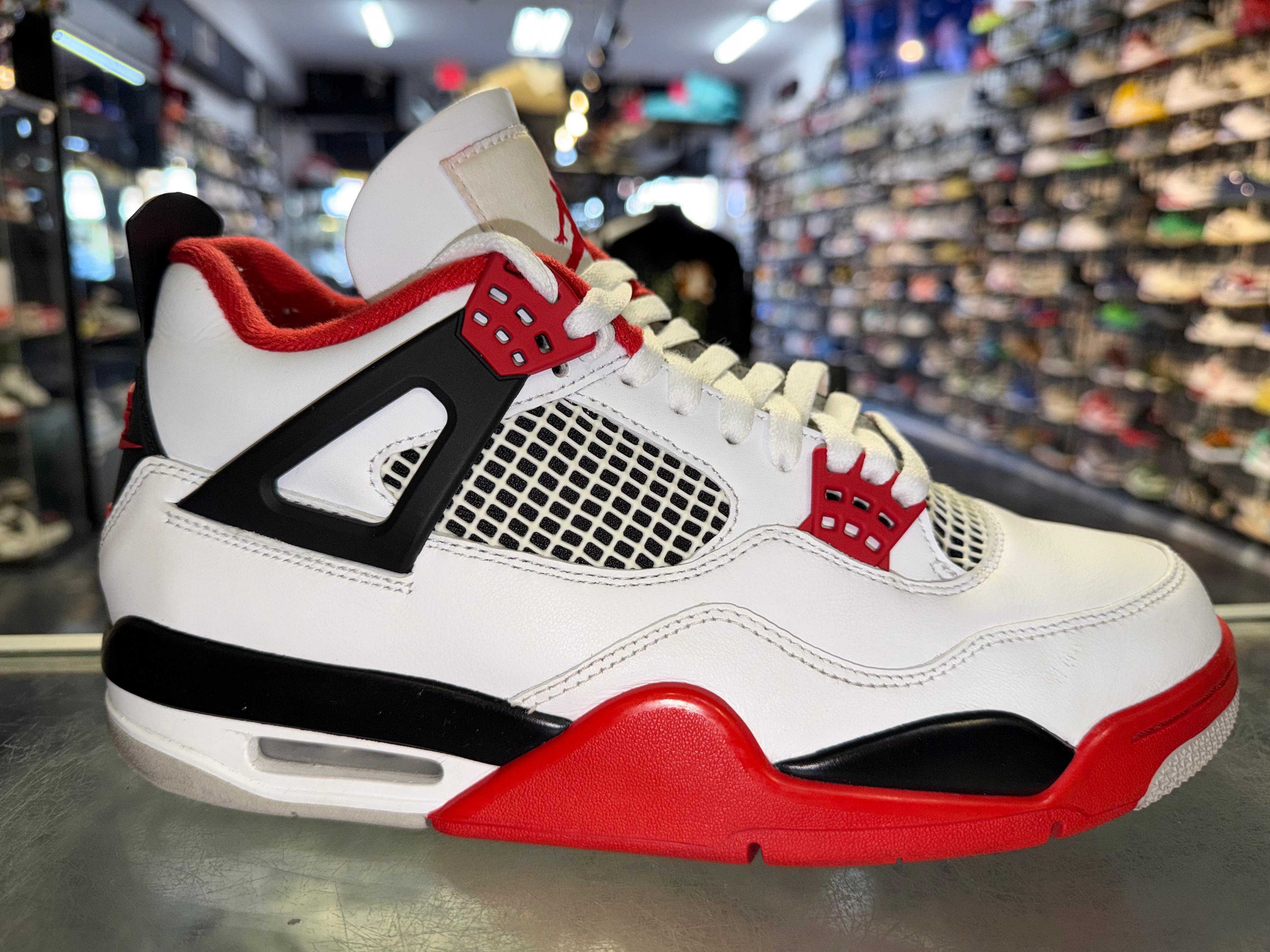 Size 9.5 Air Jordan 4 "Fire Red"