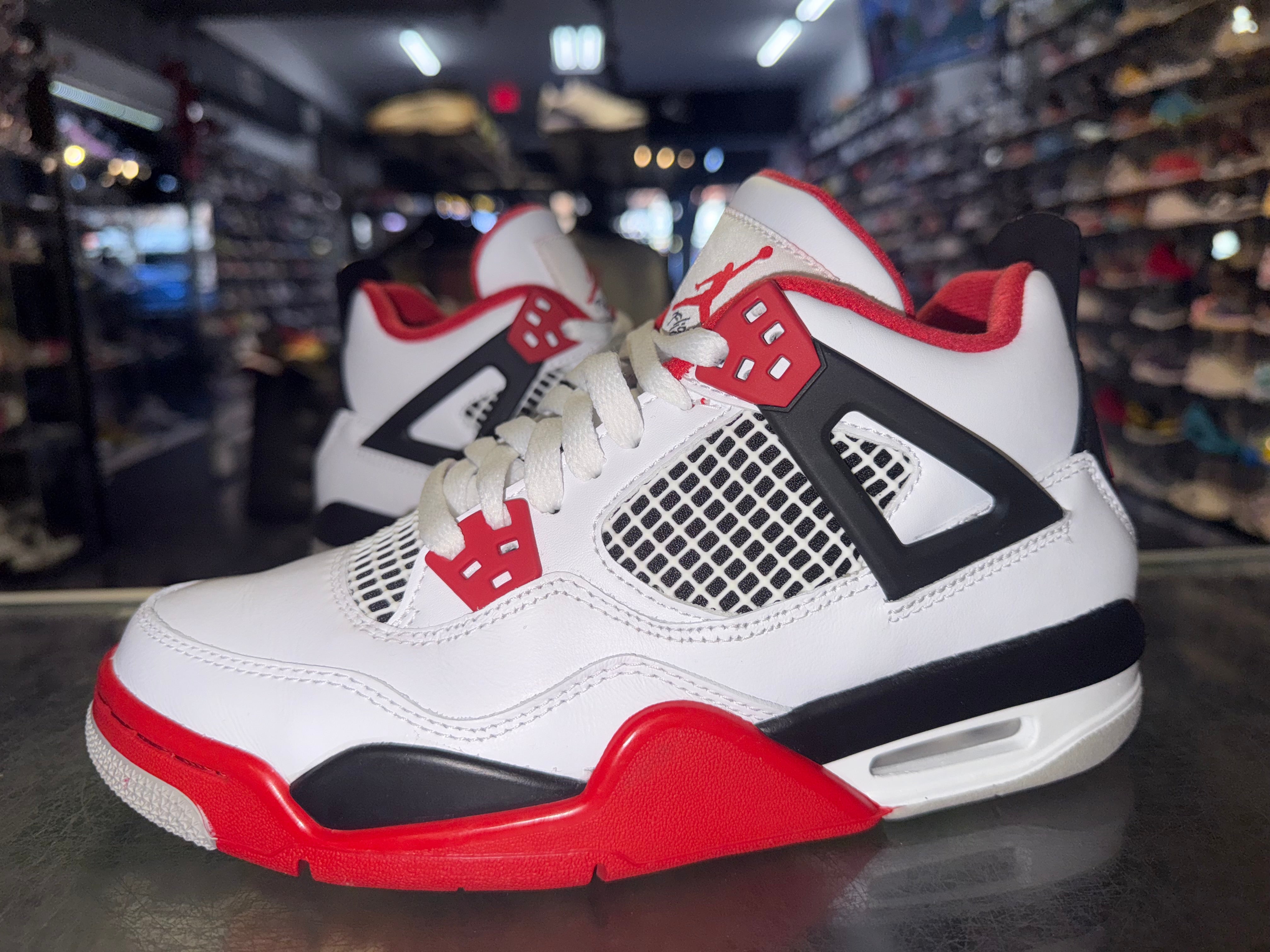 Size 6y Air Jordan 4 "Fire Red"