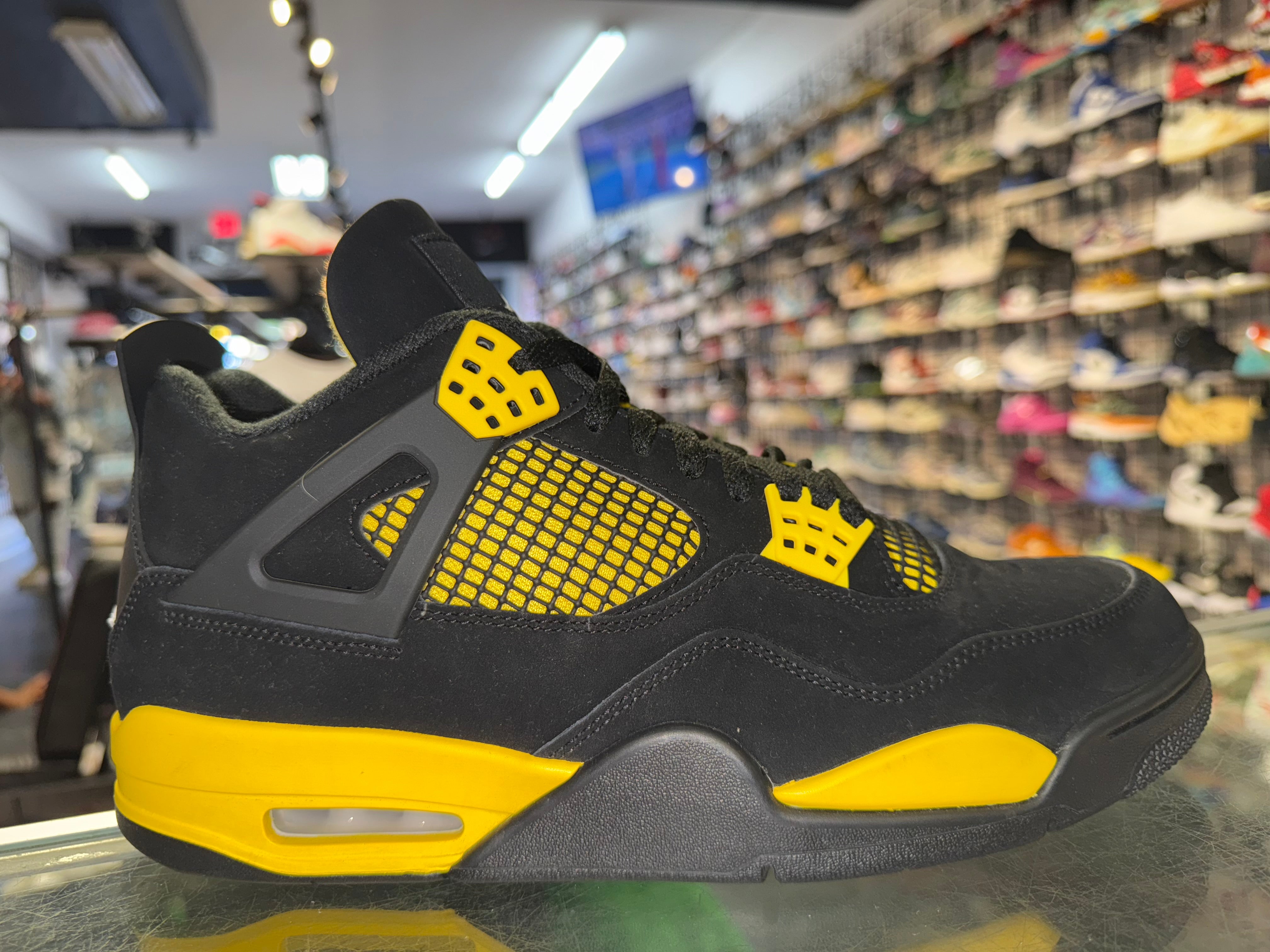 Size 11 Air Jordan 4 "Thunder"