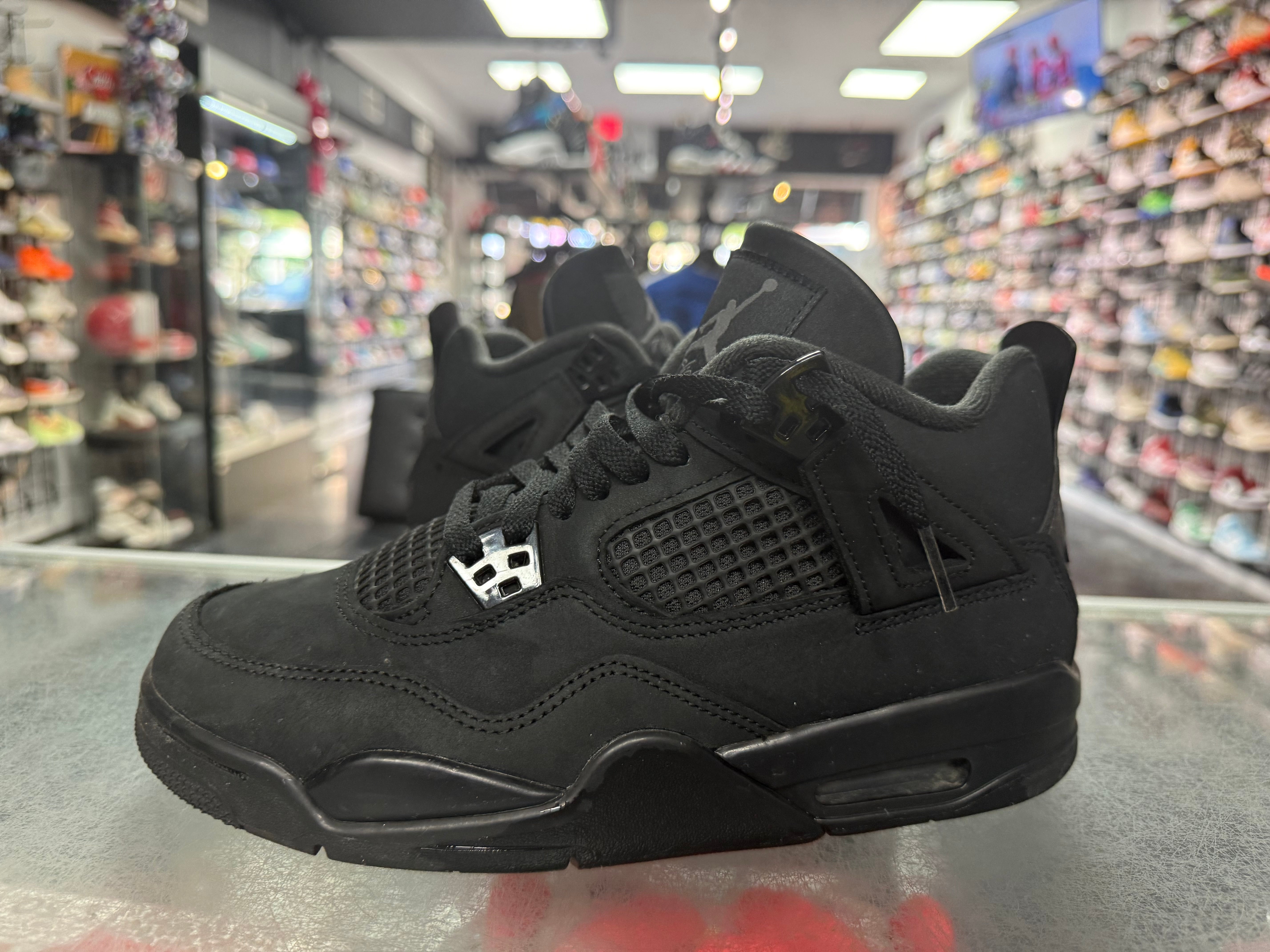 Size 7y Air Jordan 4 "Black Cat"