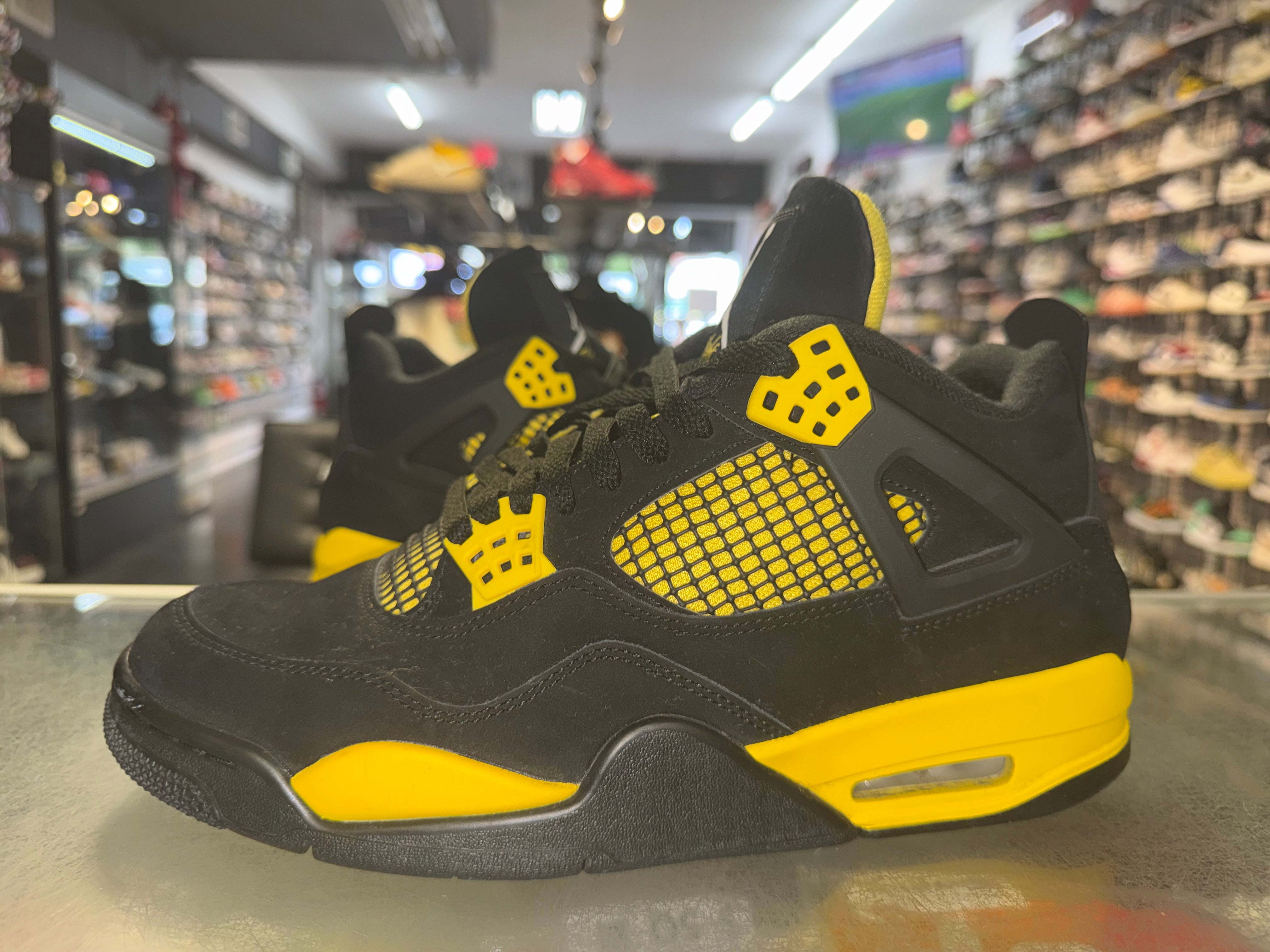 Size 9.5 Air Jordan 4 "Thunder"