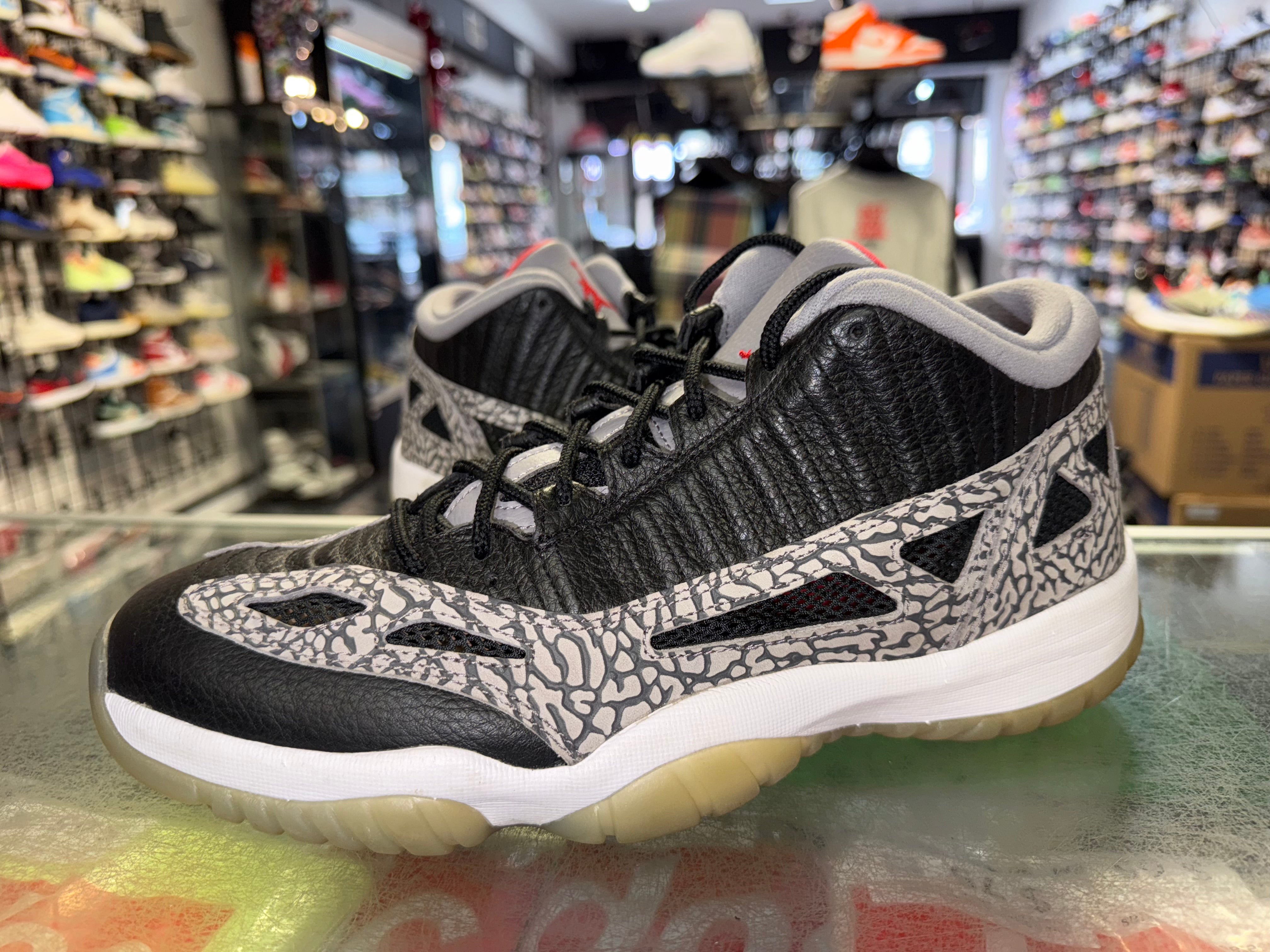 Size 11 Air Jordan 11 Low IE "Black Cement"