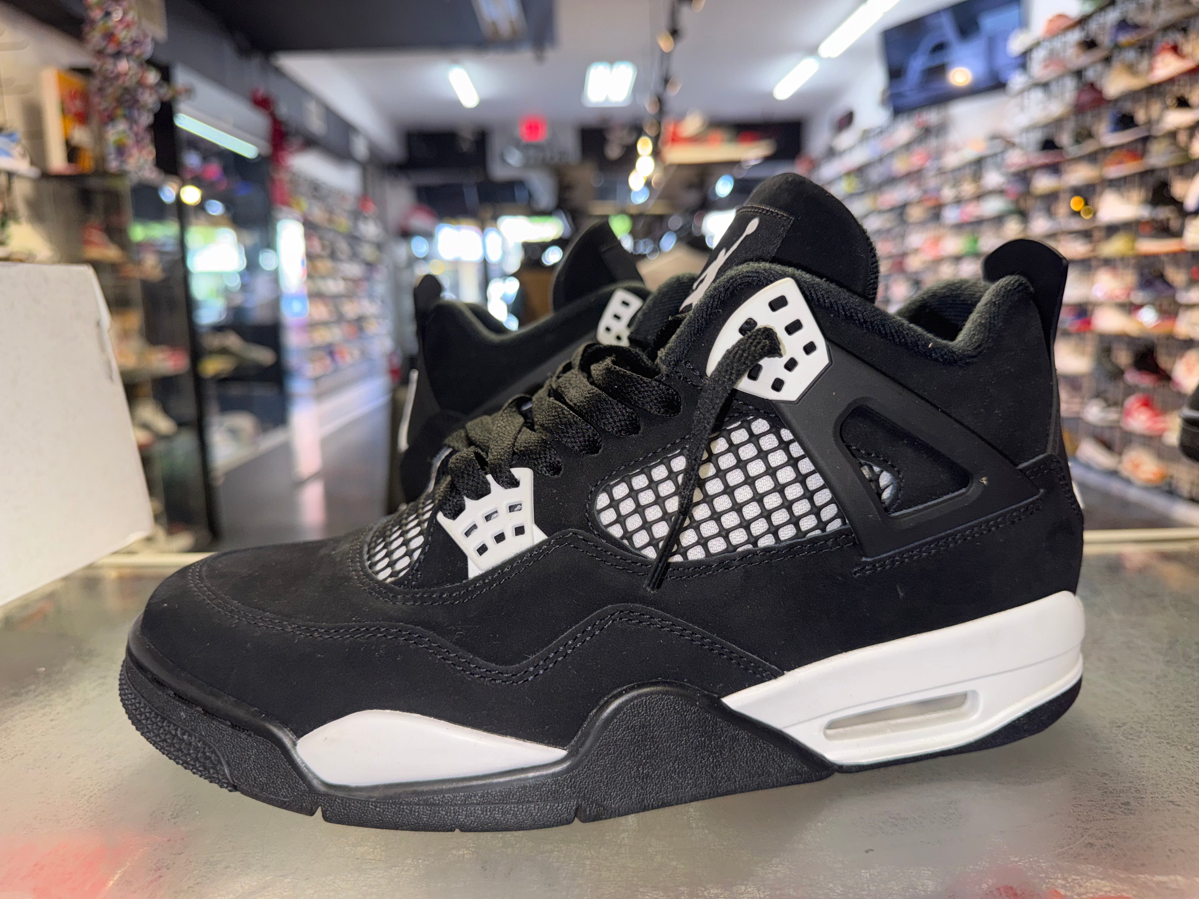 Size 9.5 Air Jordan 4 "White Thunder"