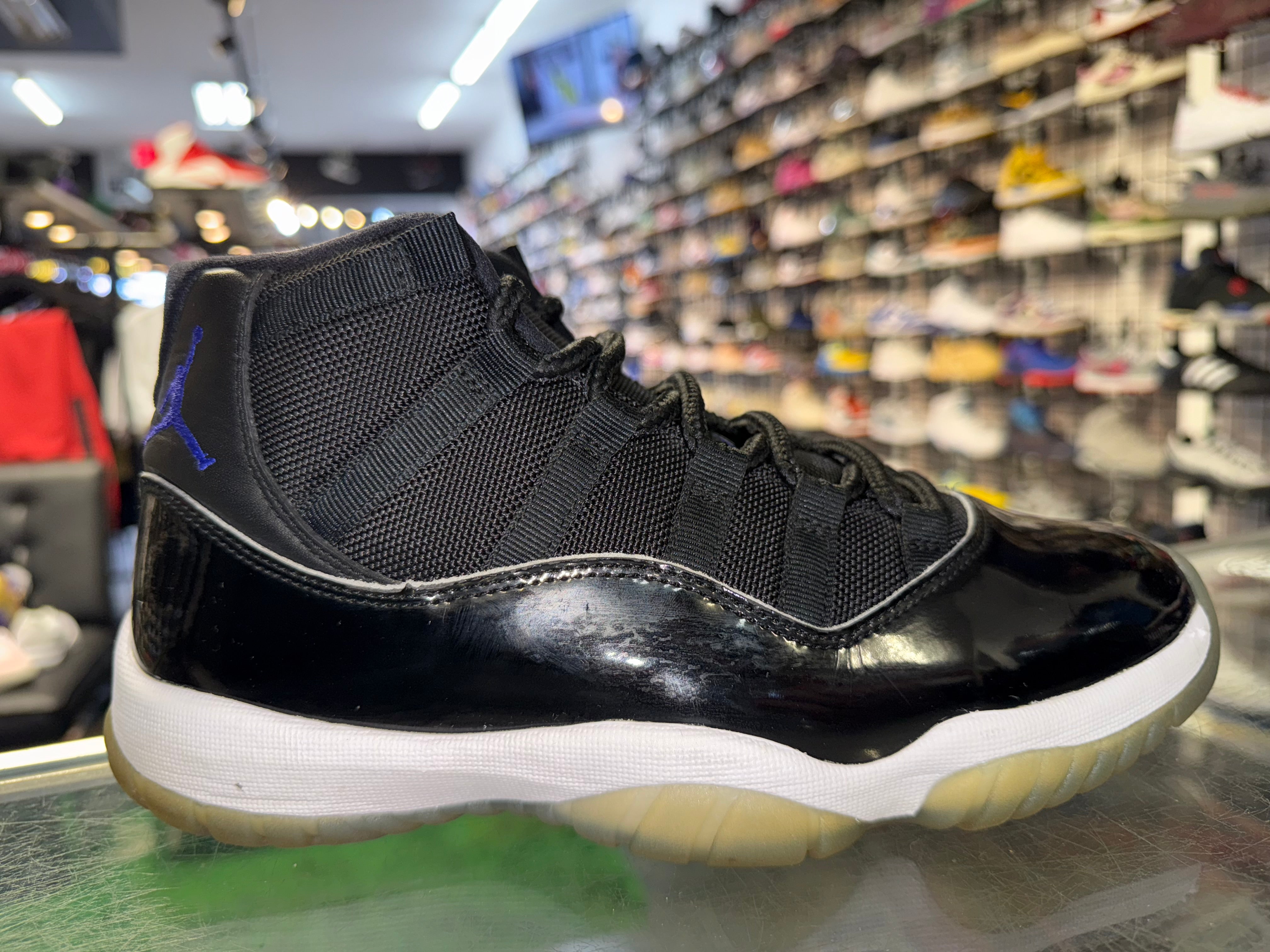 Size 7.5 Air Jordan 11 "Space Jam"
