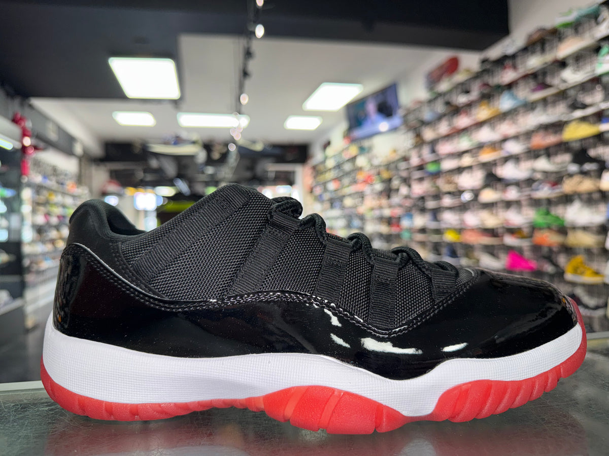 Size 9.5 Air Jordan 11 Low “Bred” Brand New