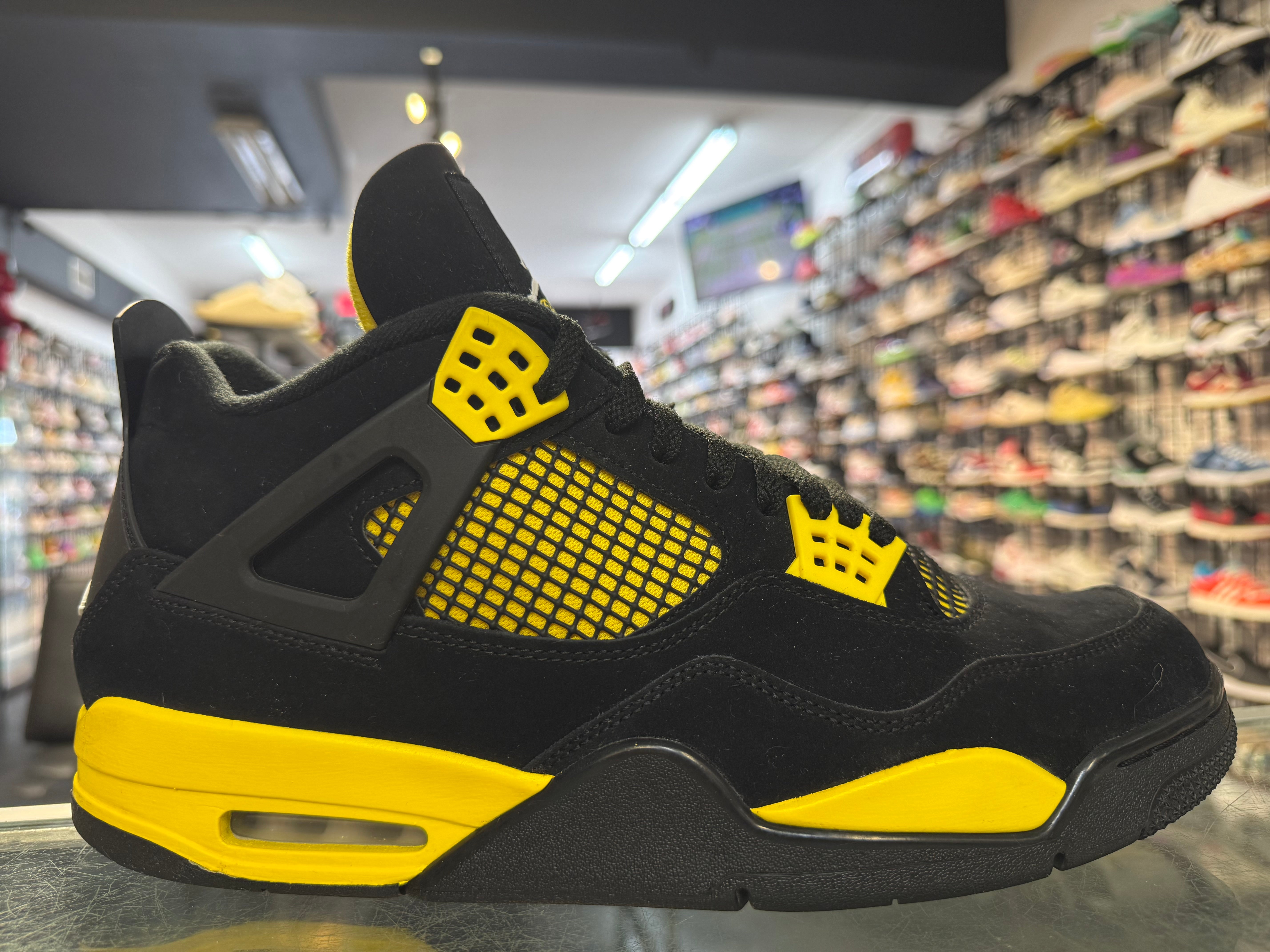 Size 13 Air Jordan 4 "Thunder"