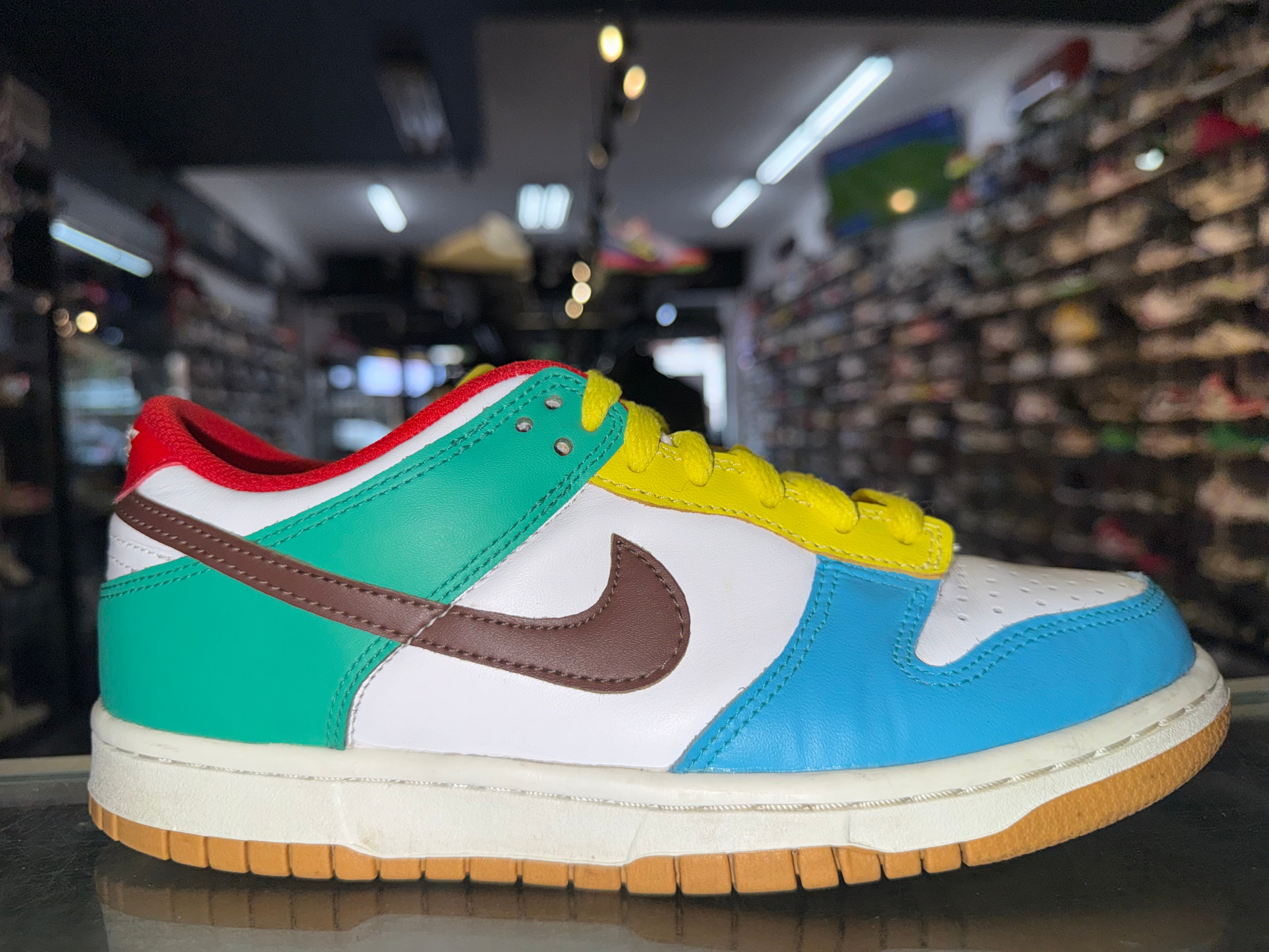 Size 5.5y Dunk Low “Free 99 White”