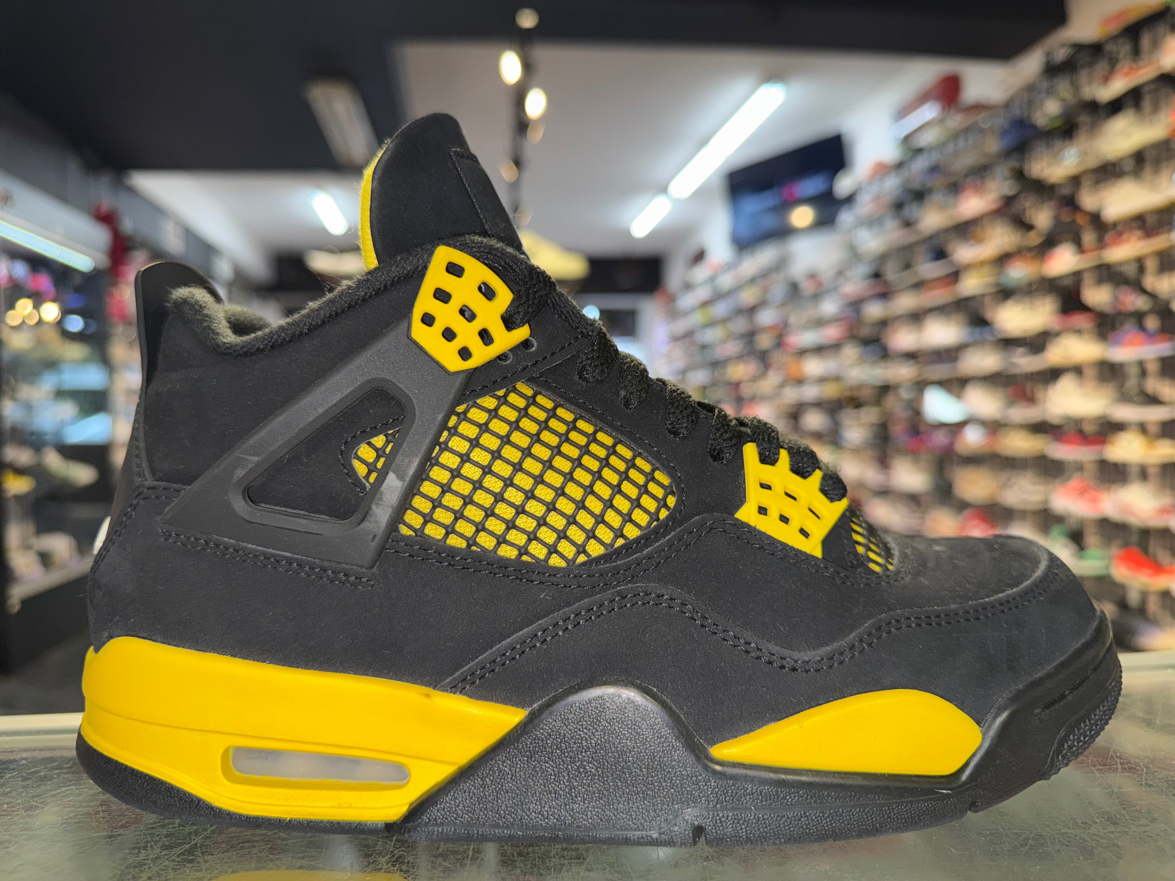 Size 7 Air Jordan 4 "Thunder"