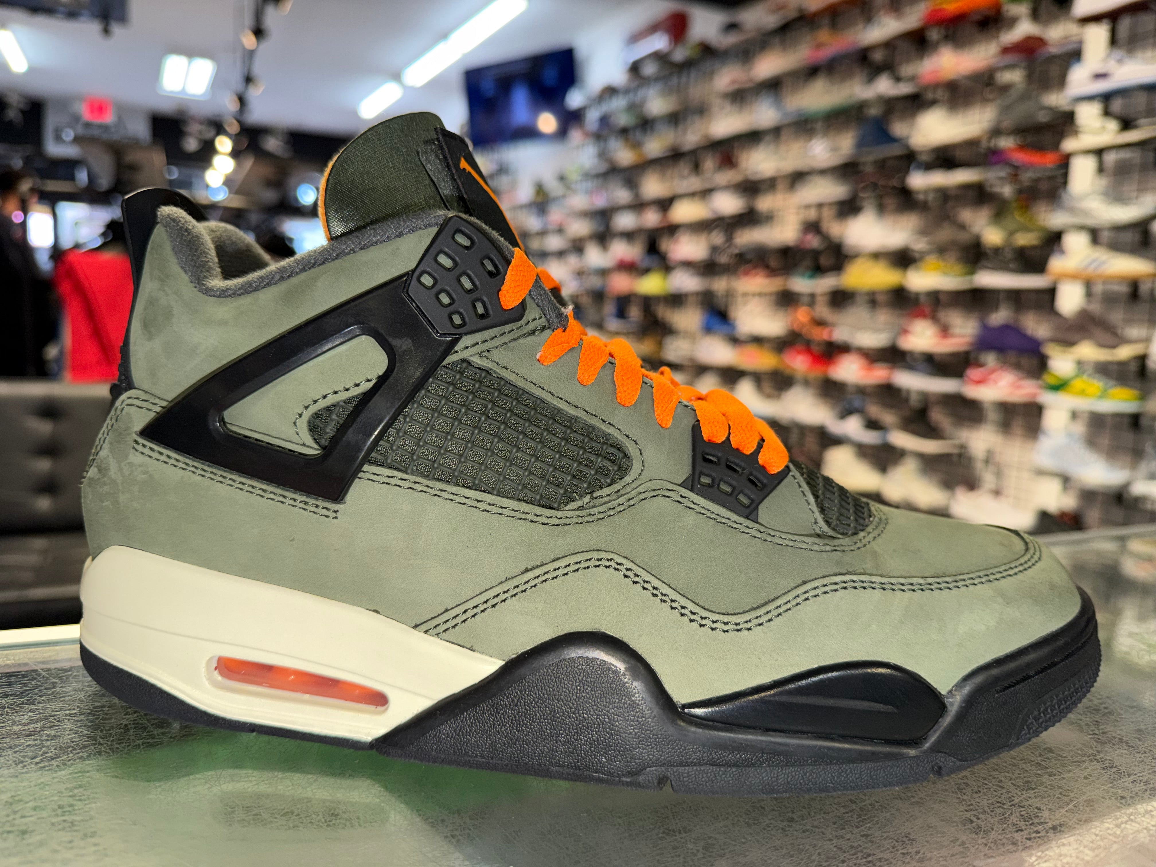 Size 10.5 Air Jordan 4 "Undefeated"