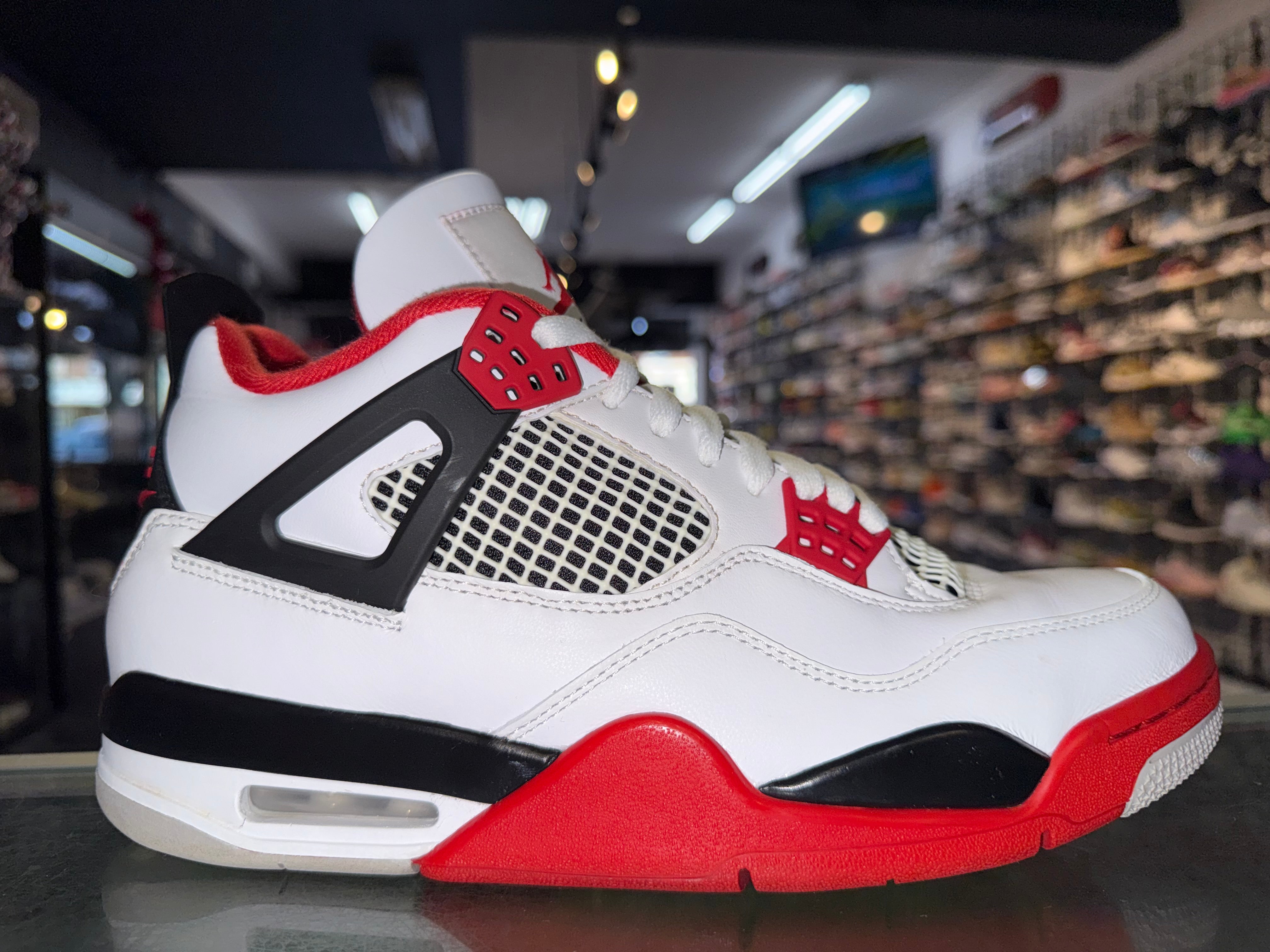 Size 9 Air Jordan 4 "Fire Red"