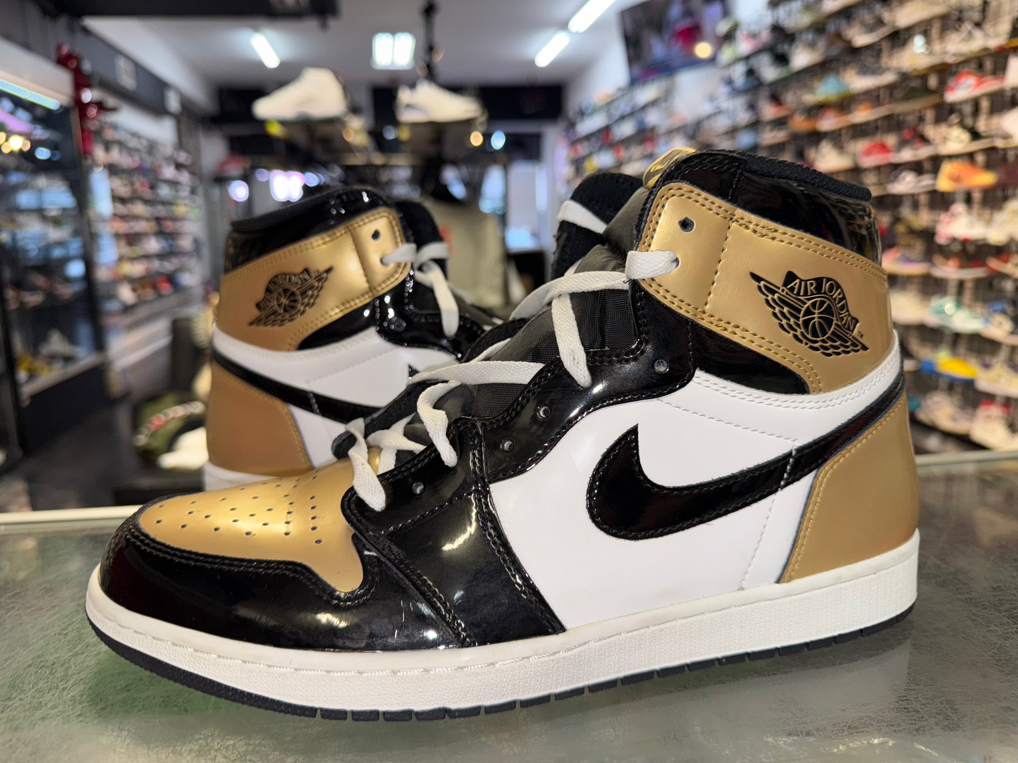 Size 11.5 Air Jordan 1 “Gold Toe”