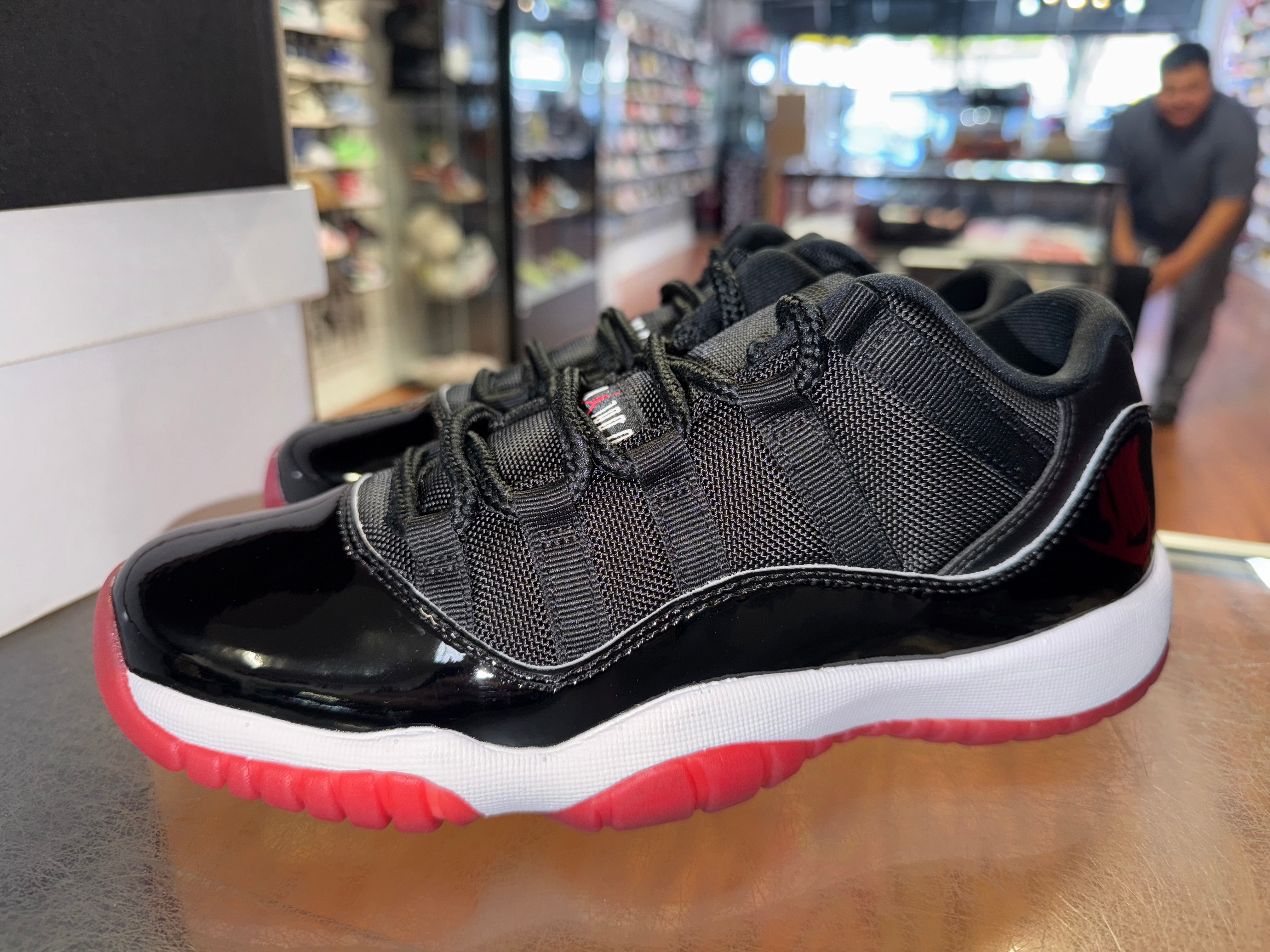 Size 7y Air Jordan 11 Low "Bred" (2025)
