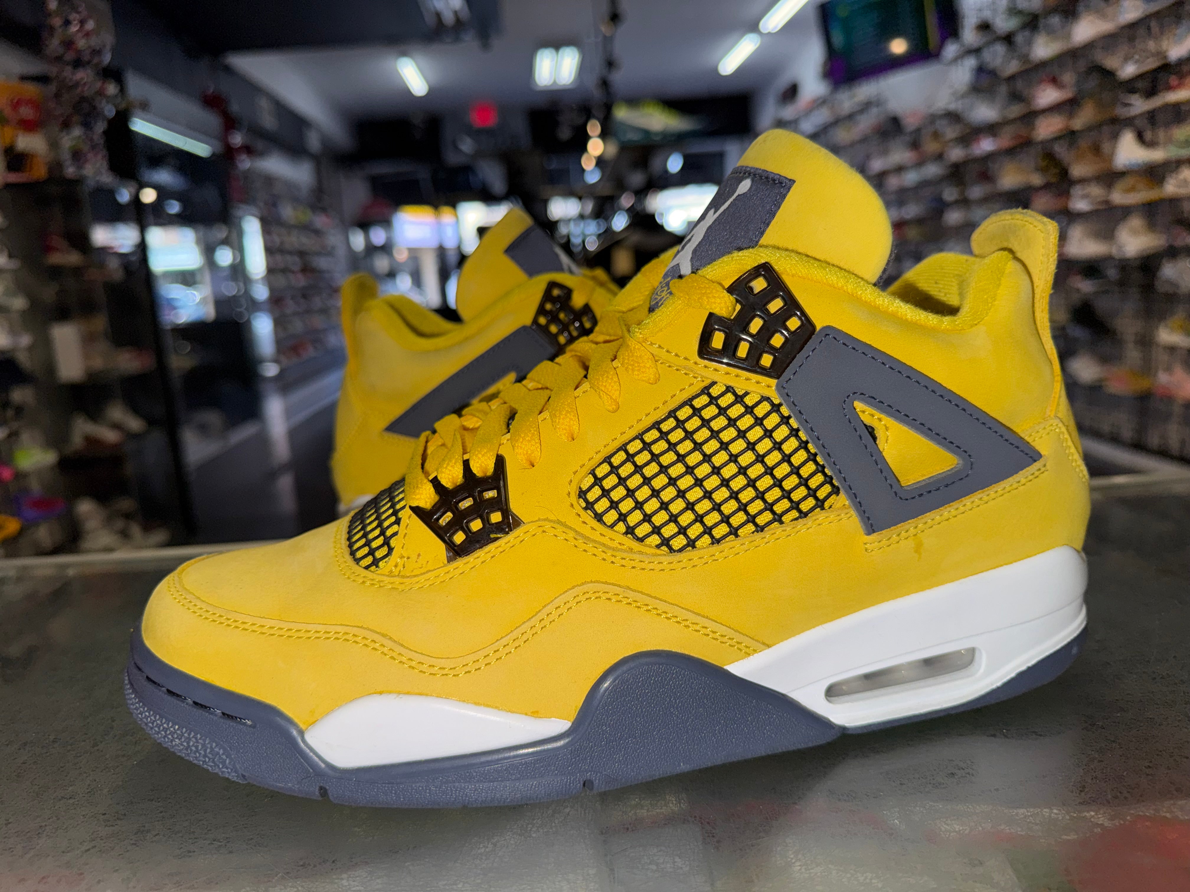 Size 10.5 Air Jordan 4 “Lightning”