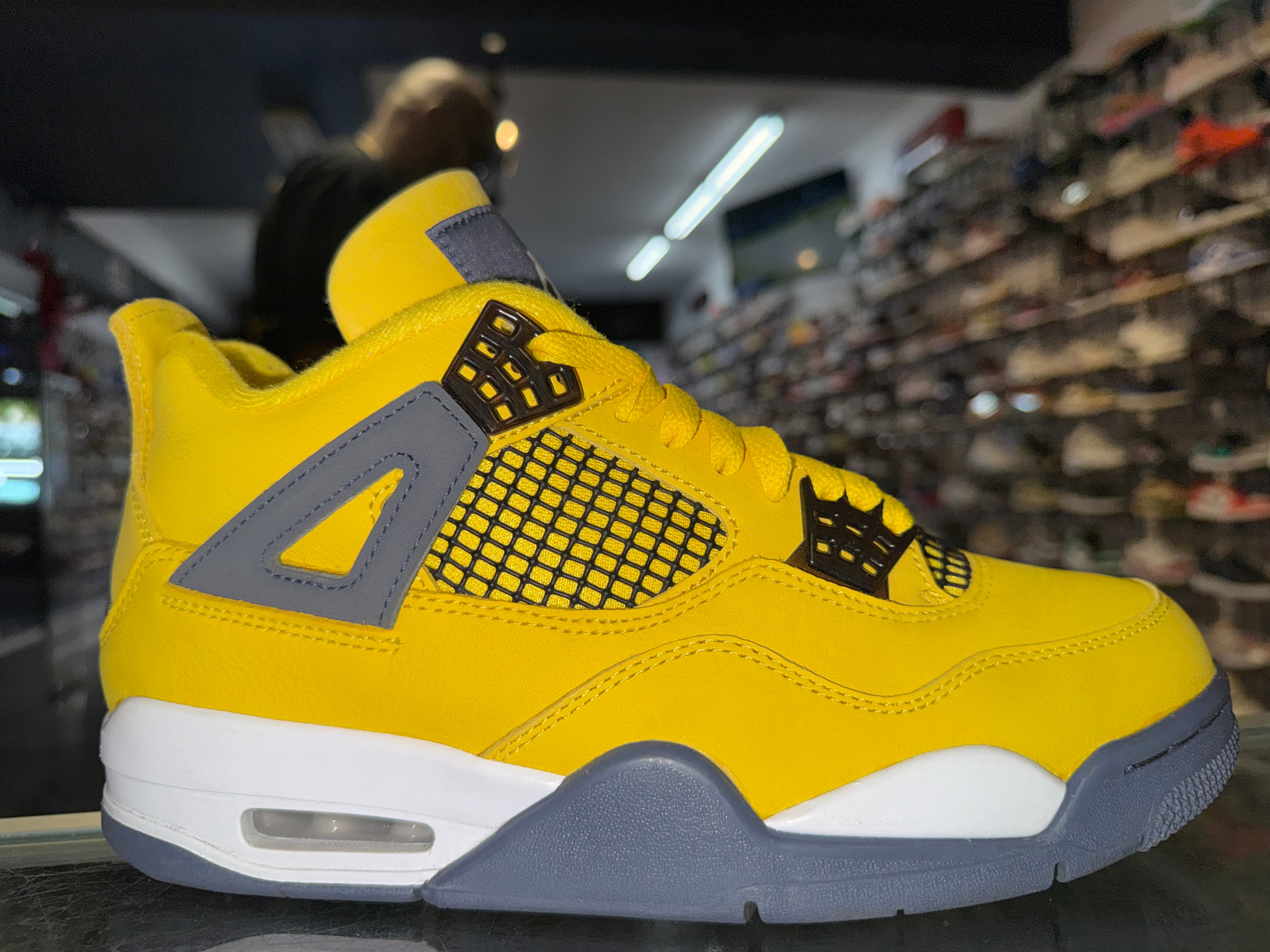 Size 7.5 Air Jordan 4 "Lightning"