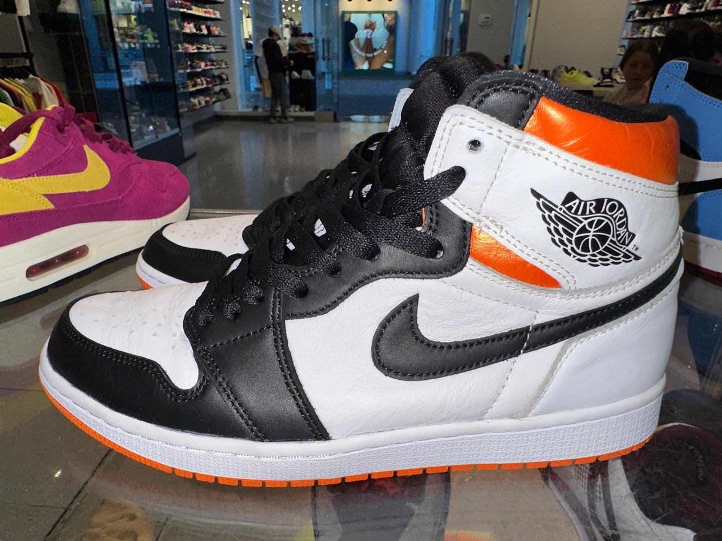 Size 9.5 Air Jordan 1 “Electro Orange” (Mall)