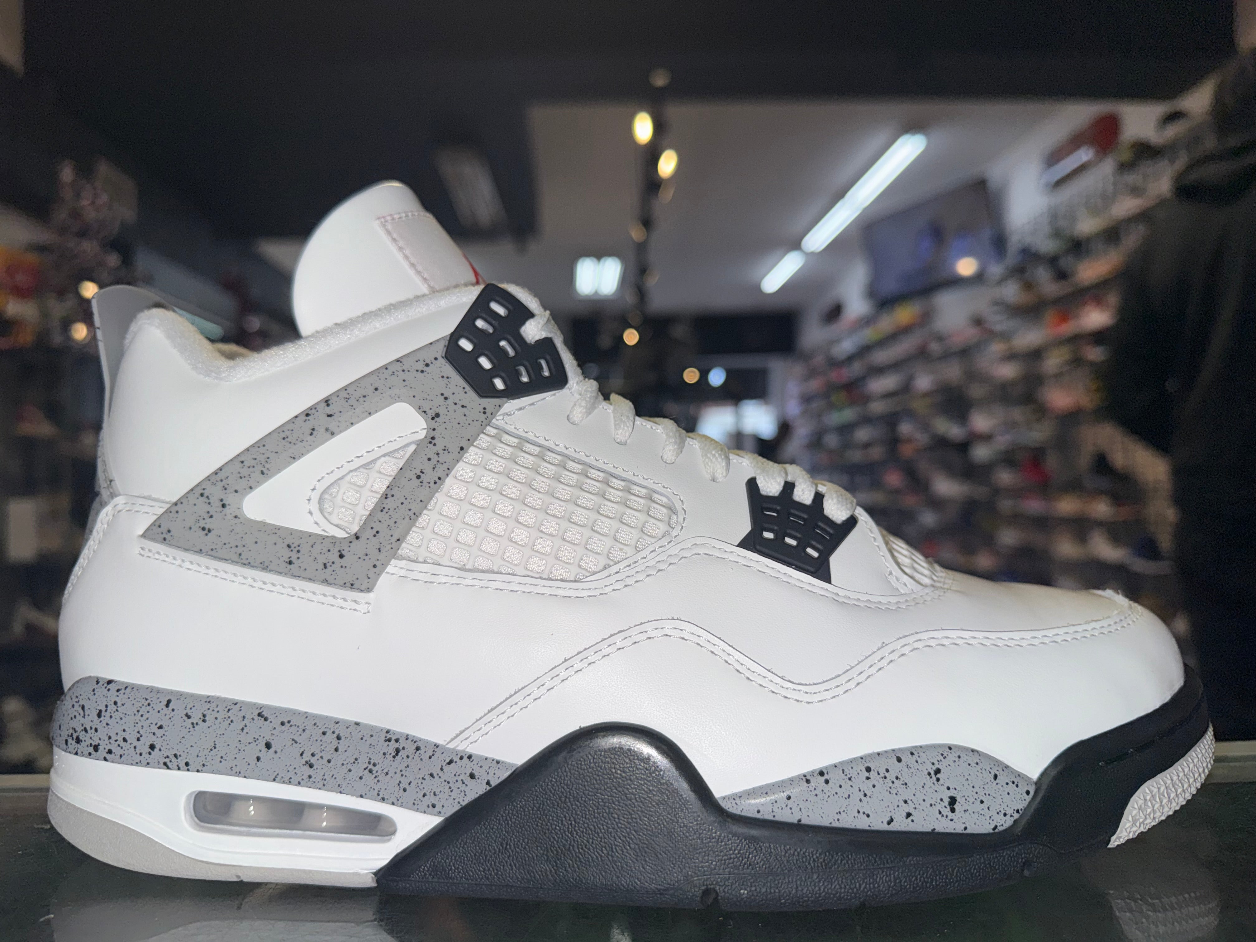 Size 12 Air Jordan 4 “White Cement”