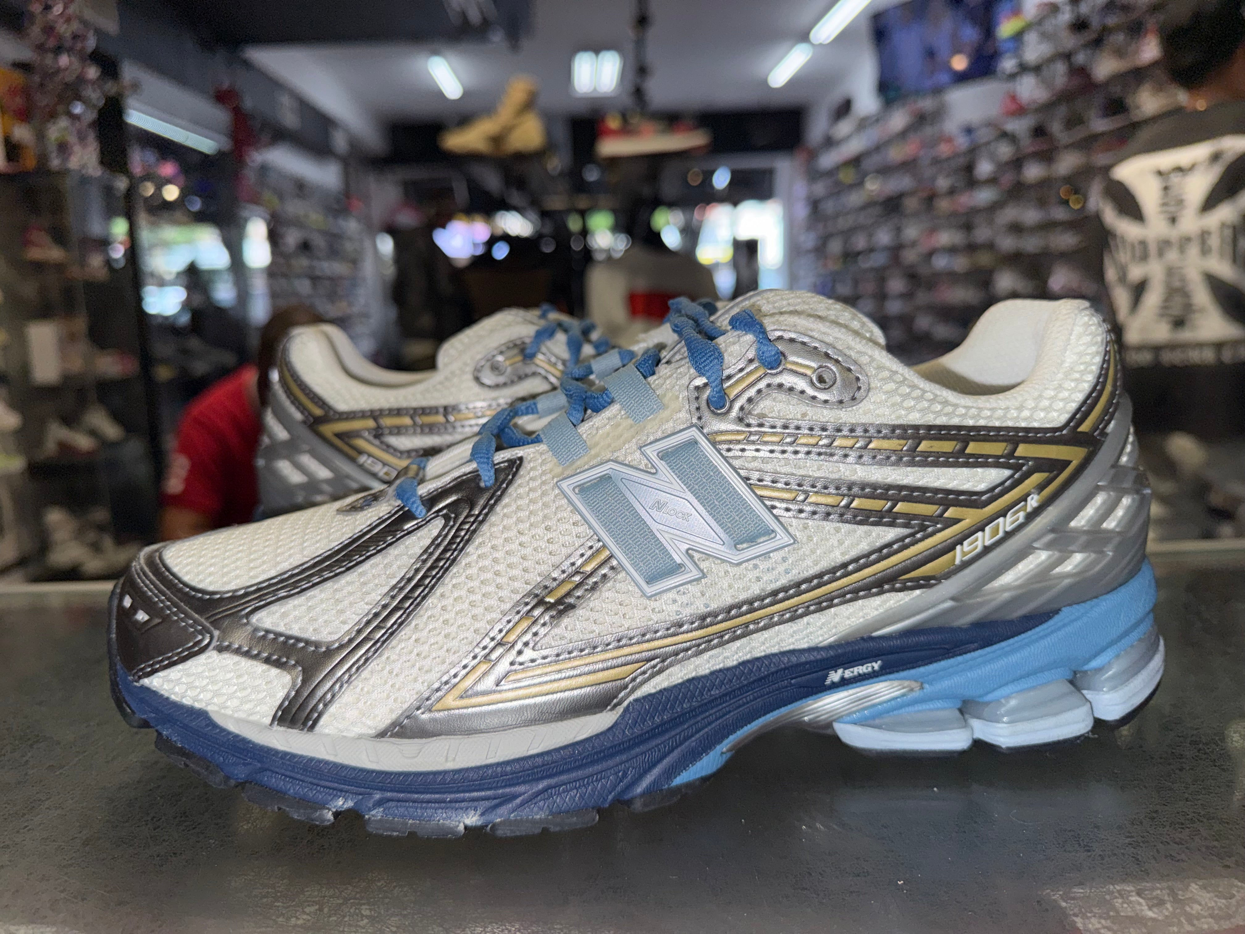 Size 11 New Balance 1906R “Silver/Blue”