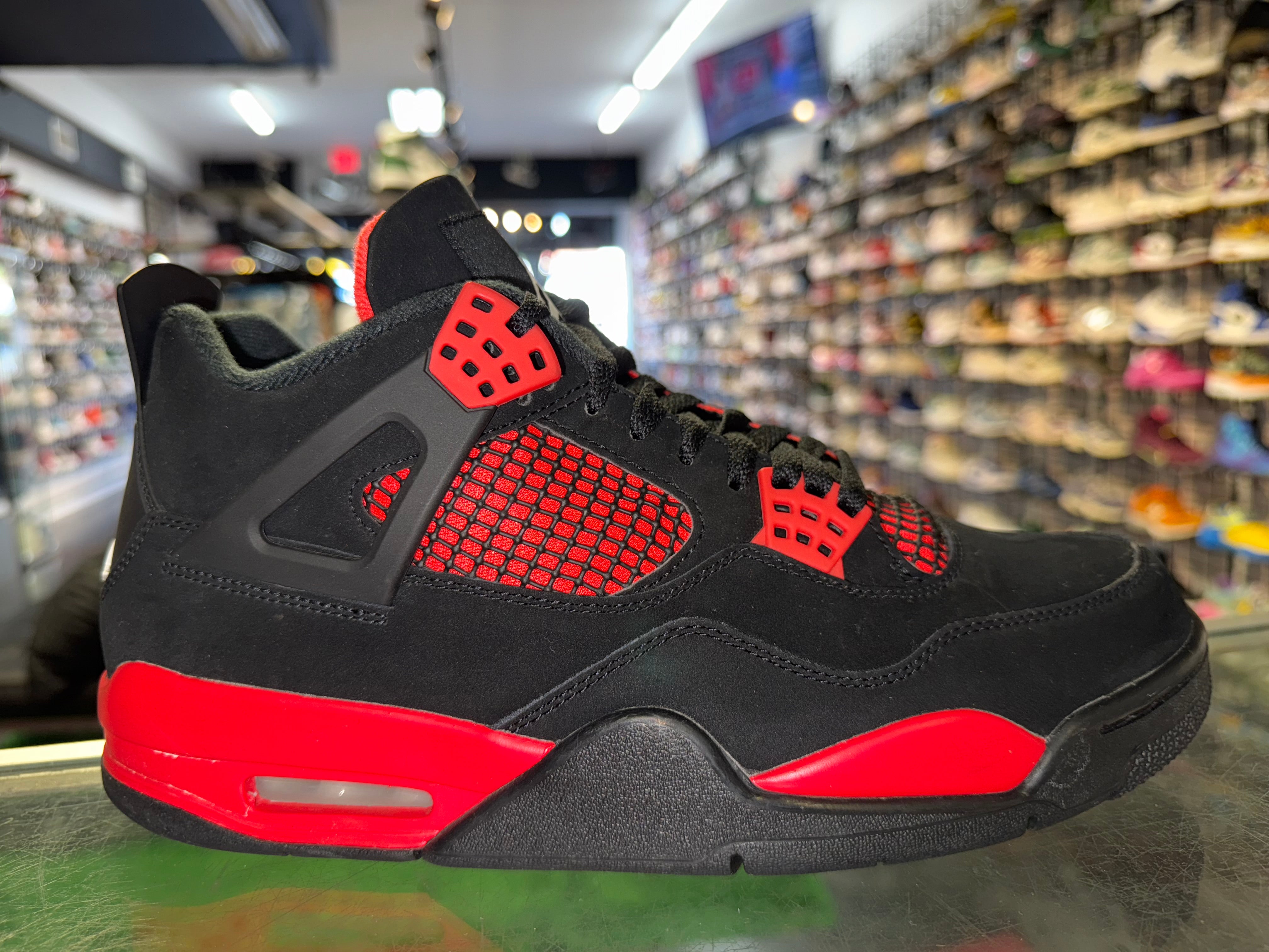 Size 9.5 Air Jordan 4 "Red Thunder"