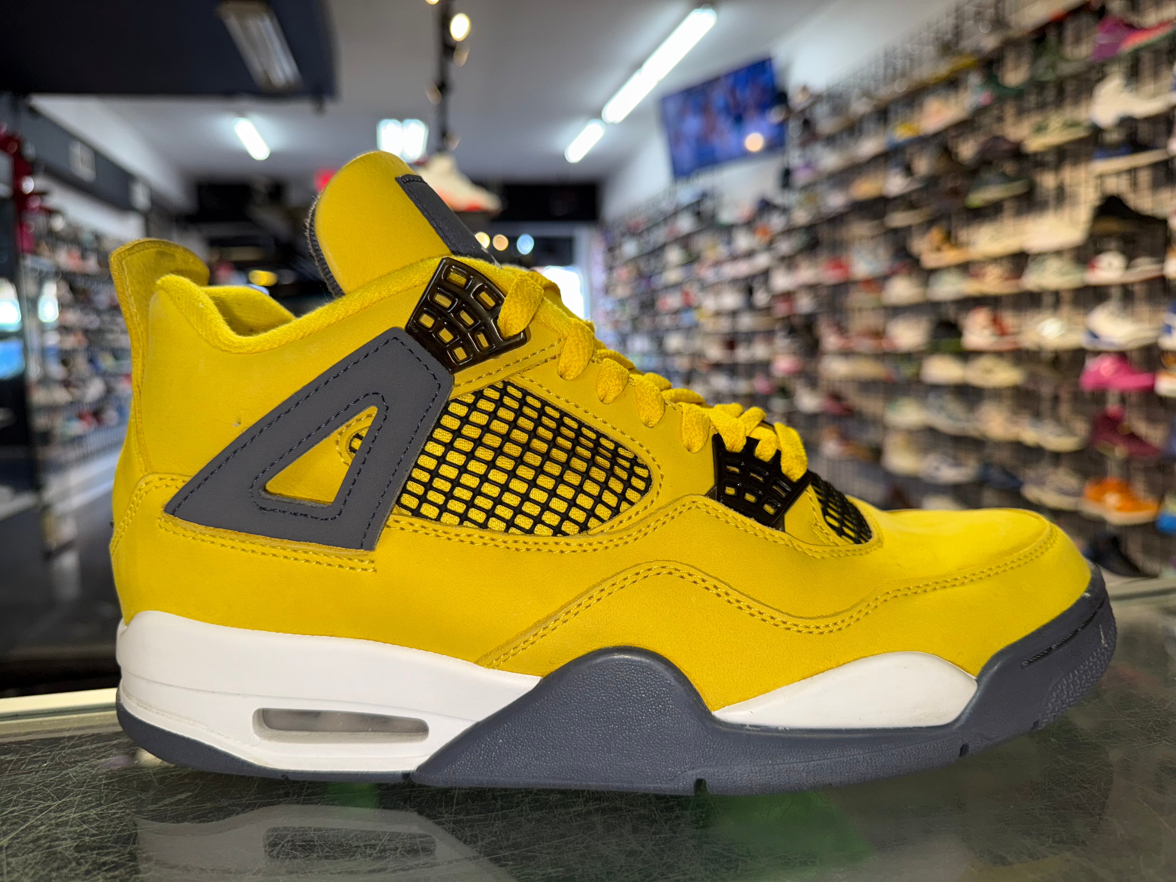 Size 9.5 Air Jordan 4 "Lightning"