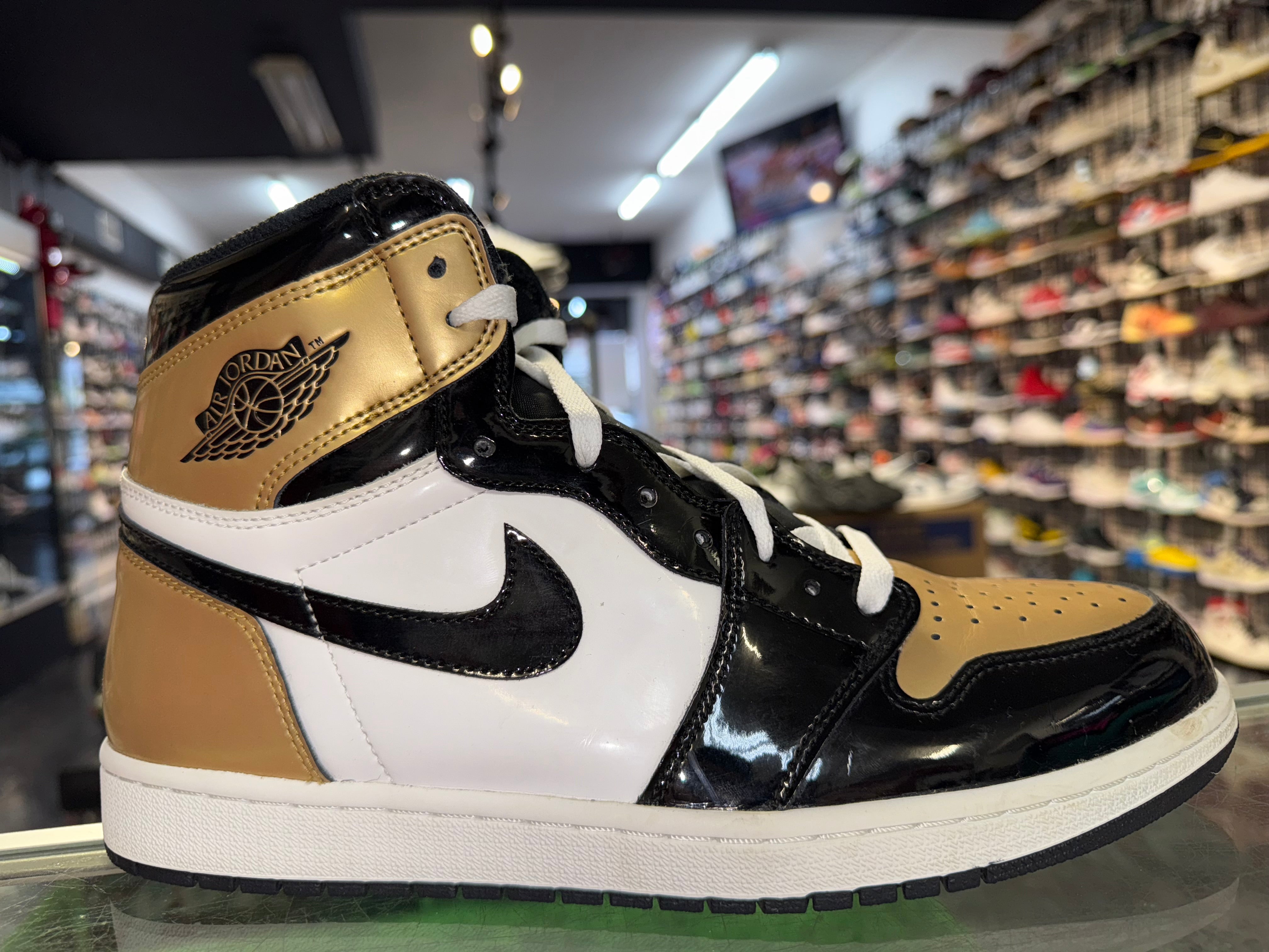 Size 11.5 Air Jordan 1 “Gold Toe”