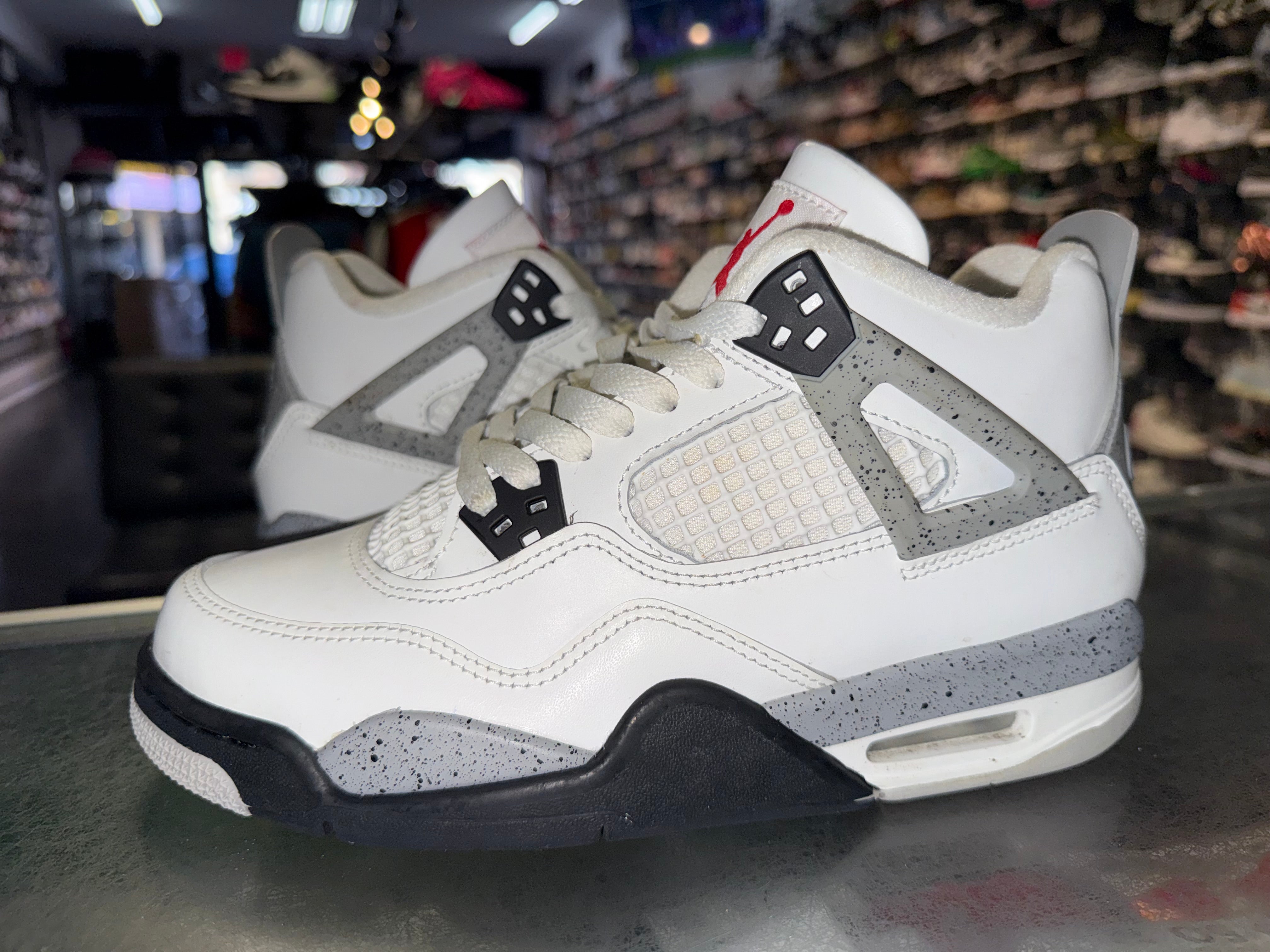 Size 6y Air Jordan 4 “White Cement”