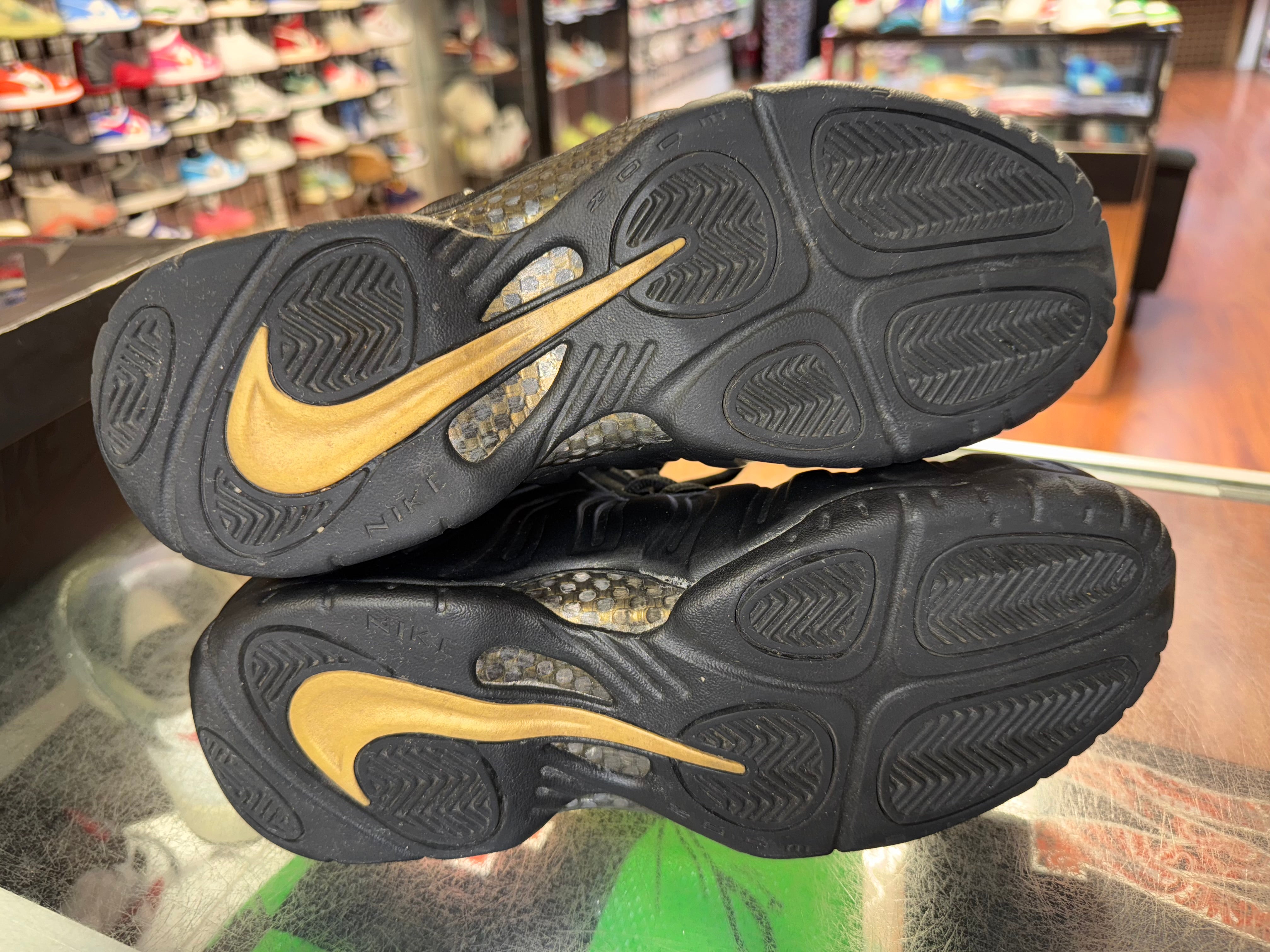 Size 9.5 Foamposite Pro "Black Metallic Gold"