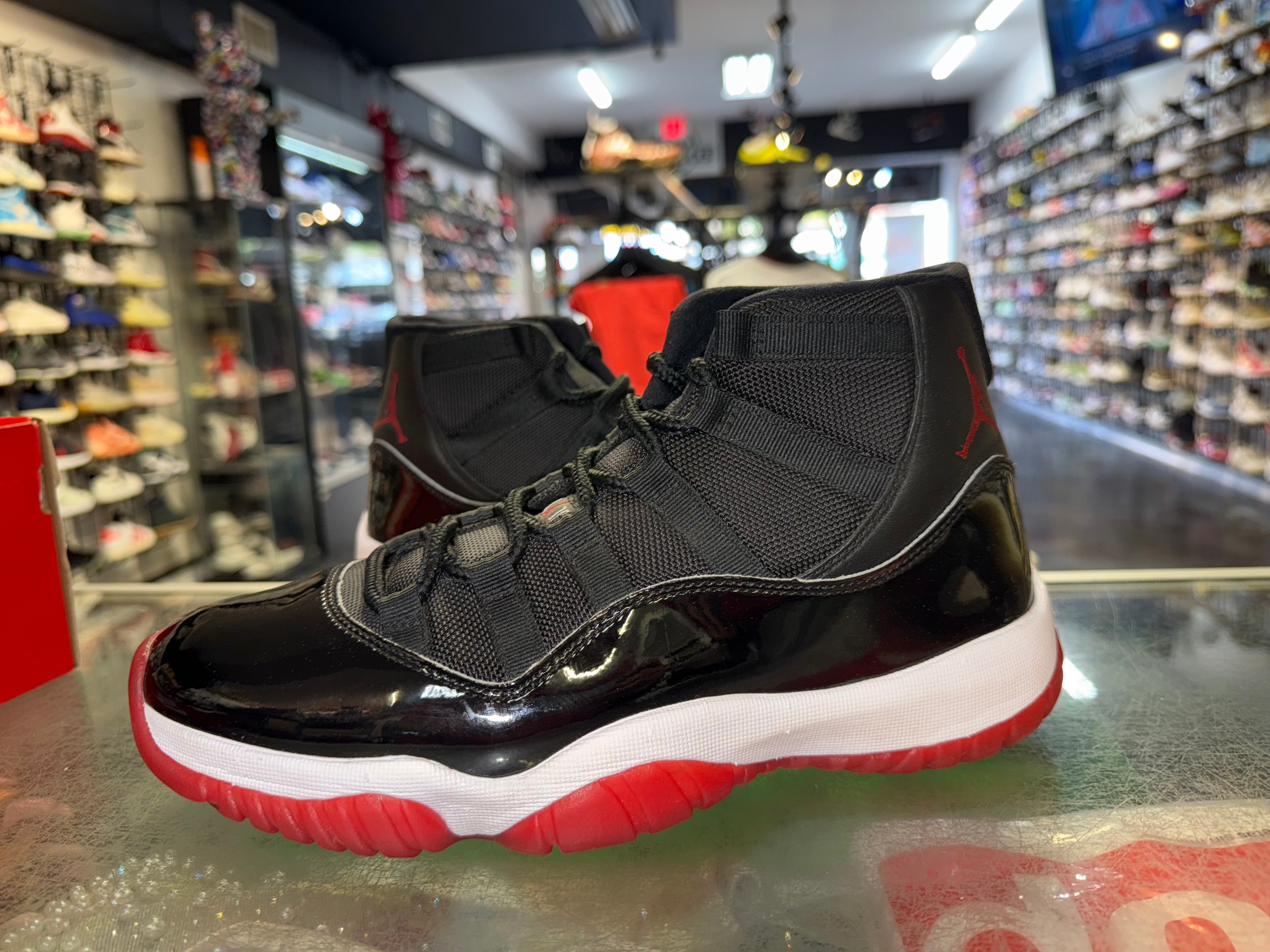 Size 8.5 Air Jordan 11 "Bred"