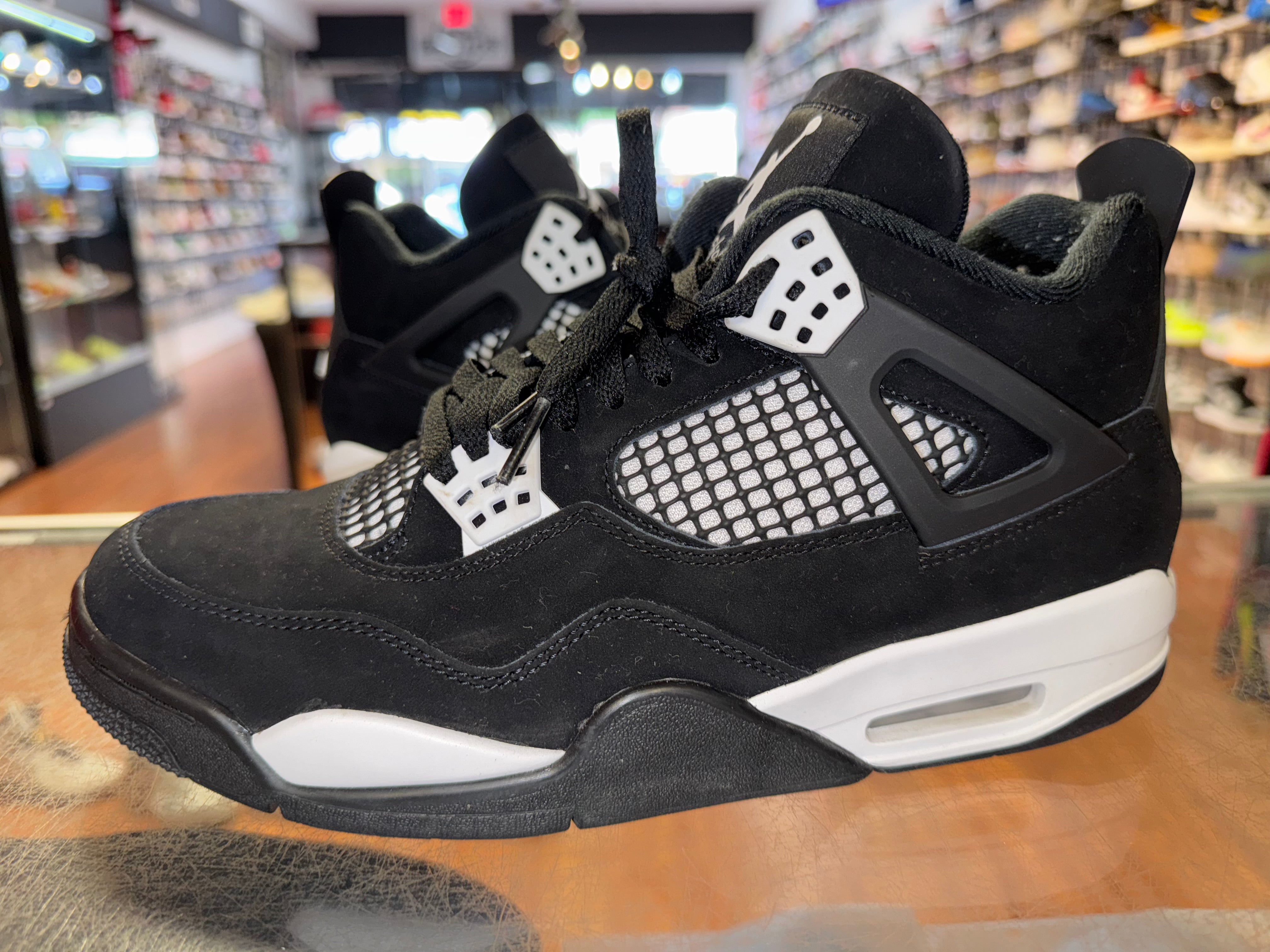 Size 9.5 Air Jordan 4 "White Thunder"