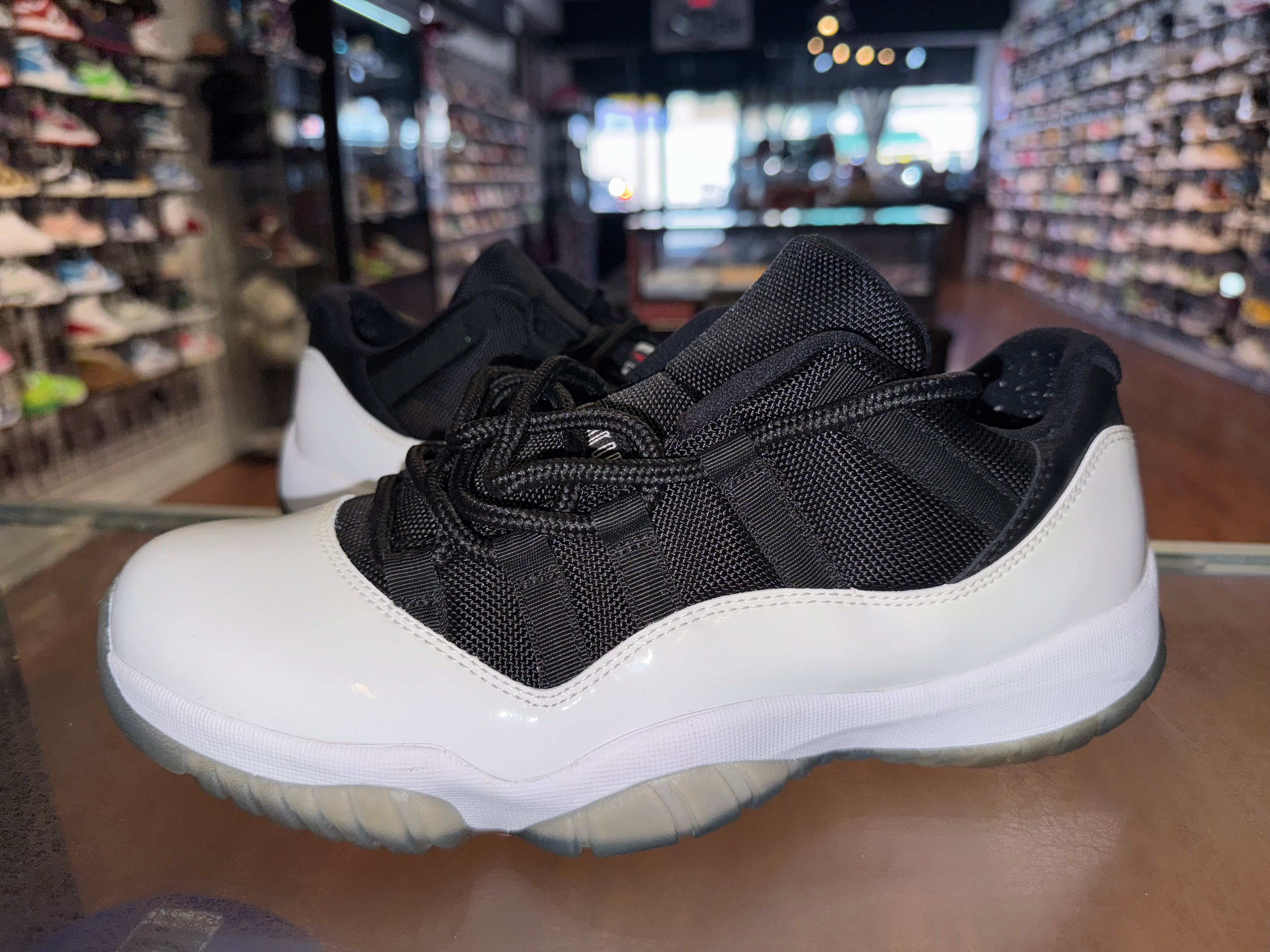 Size 9.5 Air Jordan 11 Low “Tuxedo”