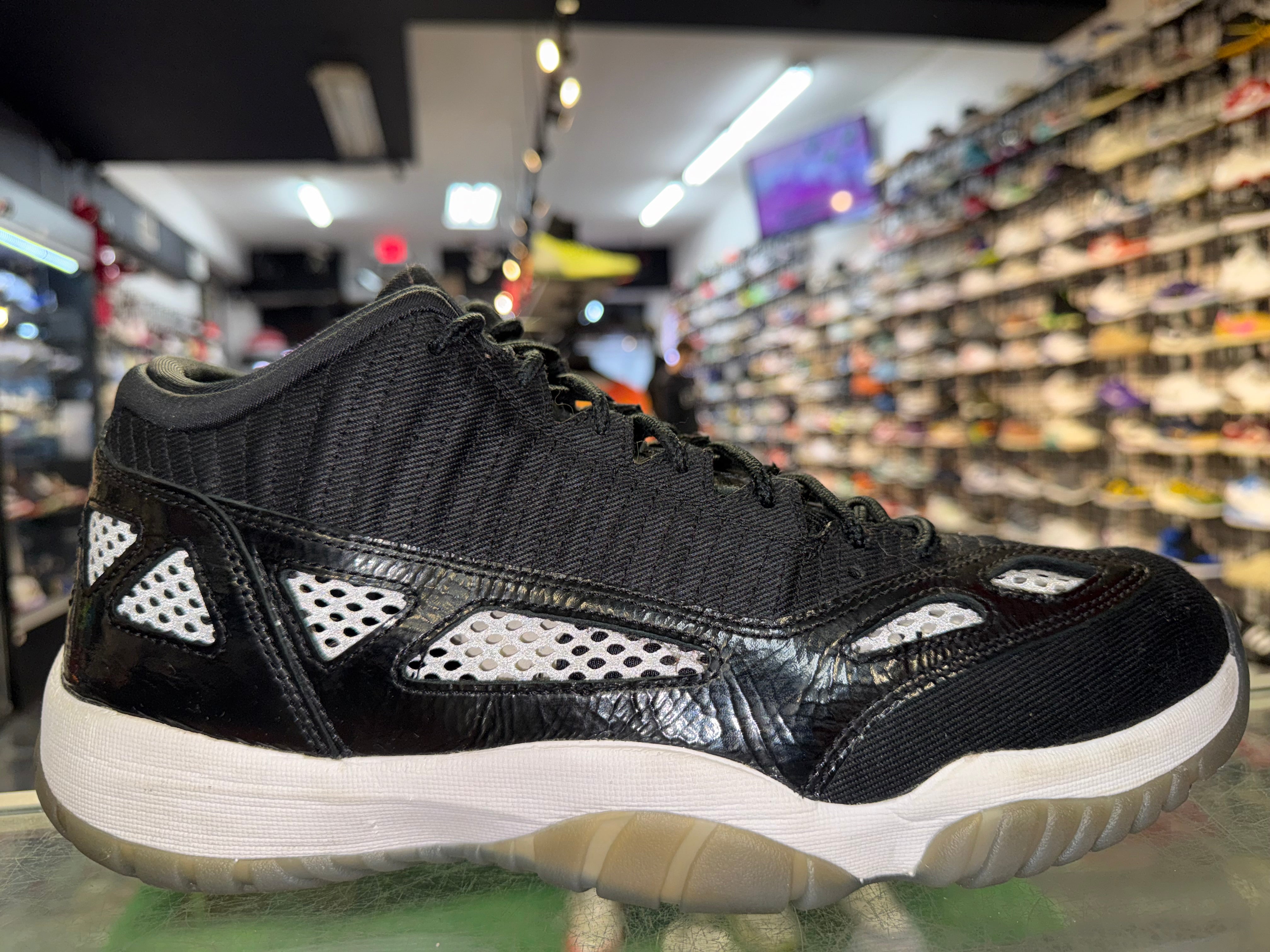 Size 12 Air Jordan 11 Low IE "Craft Black White"