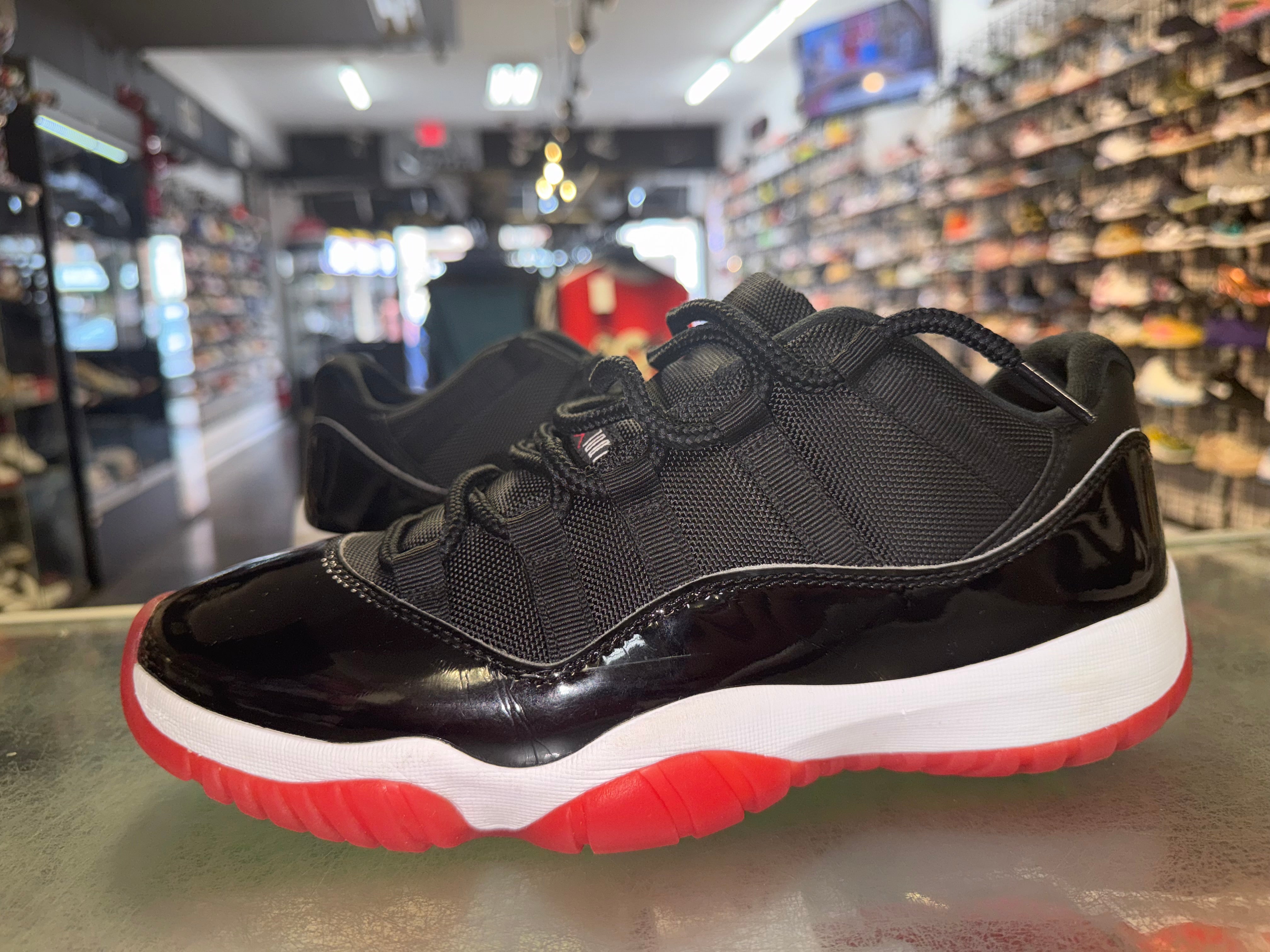 Size 9.5 Air Jordan 11 Low "Bred"