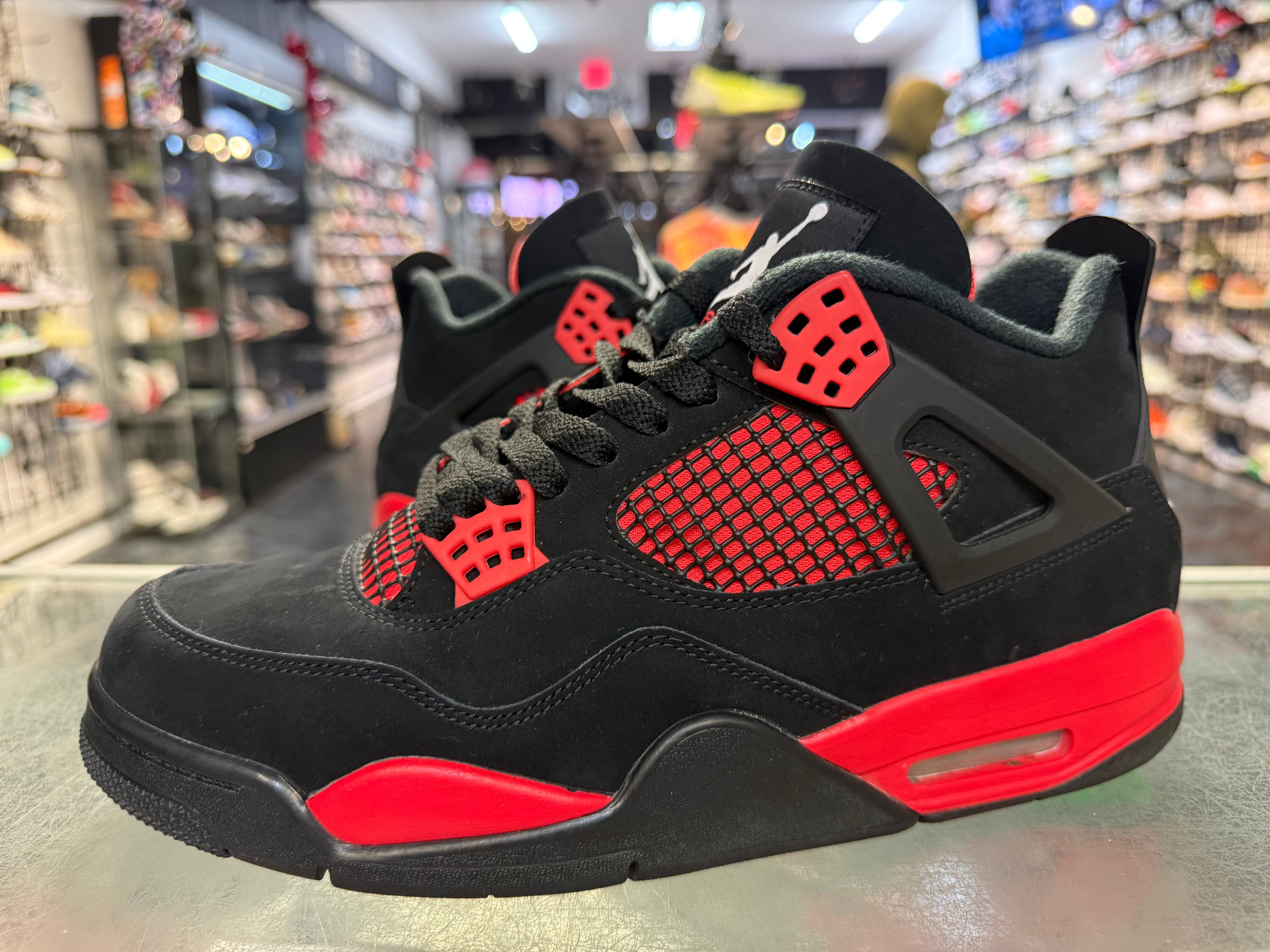Size 9.5 Air Jordan 4 "Red Thunder"