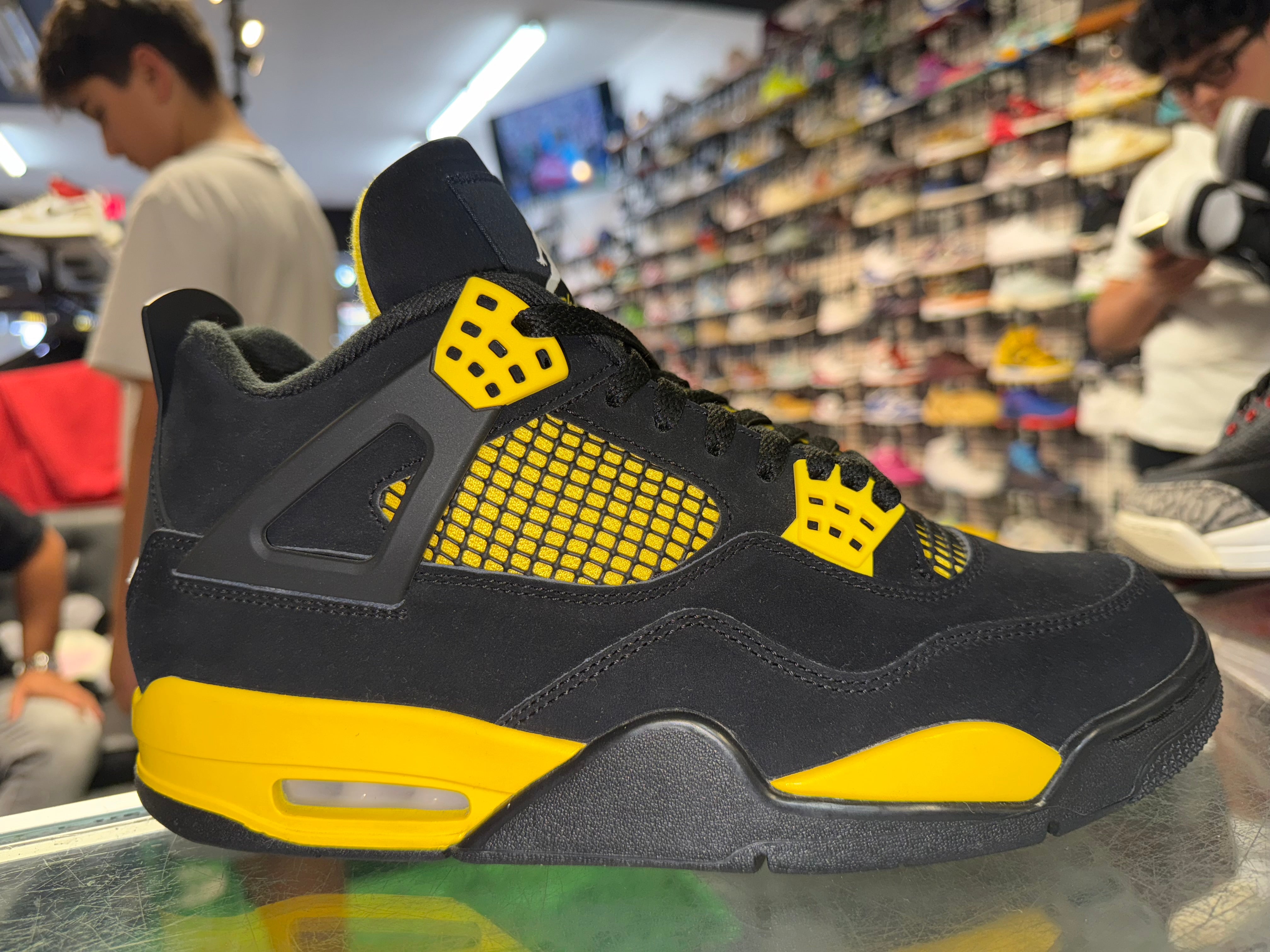 Size 10 Air Jordan 4 "Thunder"